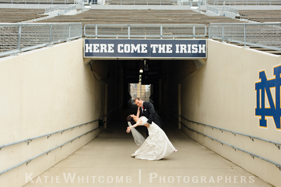 bride & groom dipping on the notre dame football field