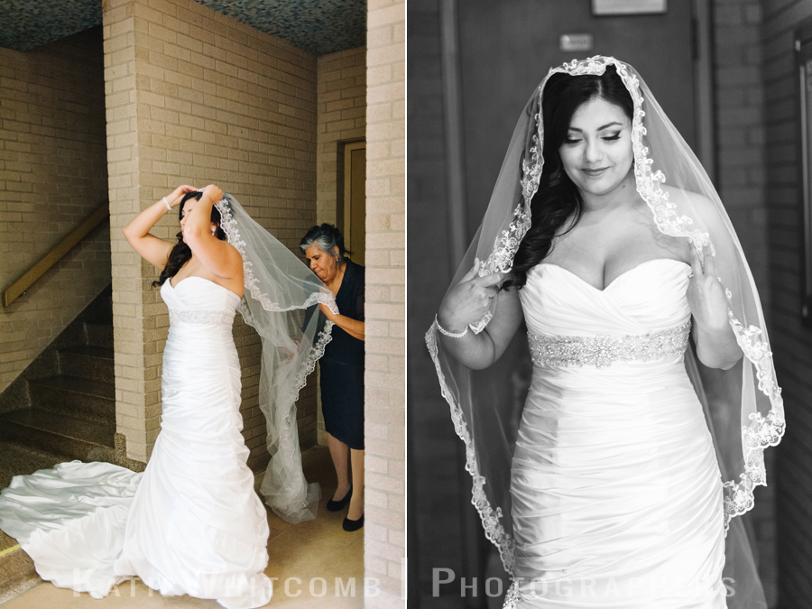 bride putting her veil on