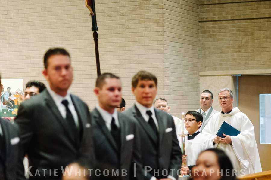 groom enter the church for the hispanic ceremony at st matthews church in south bend