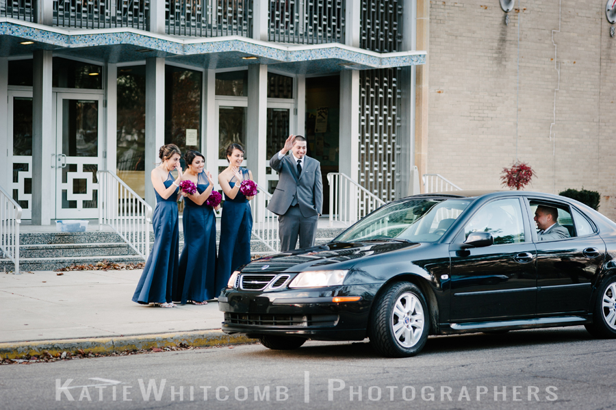 maids of honor and best man waving the bride and groom off to the reception after the ceremony at st matthews church