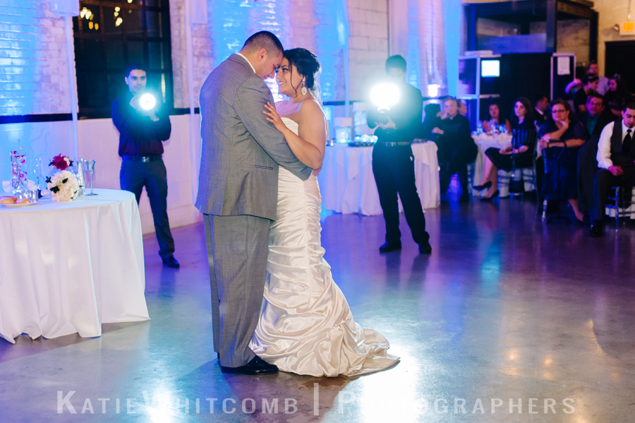 bride and groom's first dance during their wedding reception at the brick in south bend