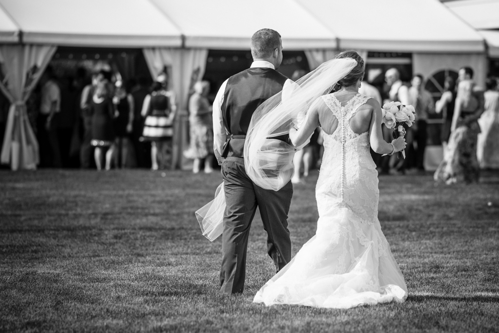 black and white bride and groom cocktail hour