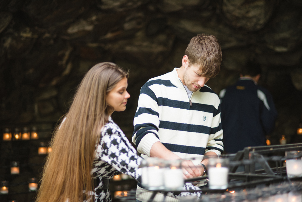 notre dame grotto candle catholic engagement session stripes hou