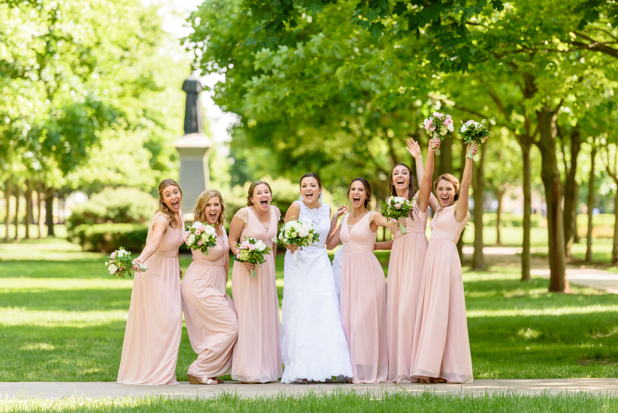 bridal bouquet by country florist with roses, peonies & ranunculus