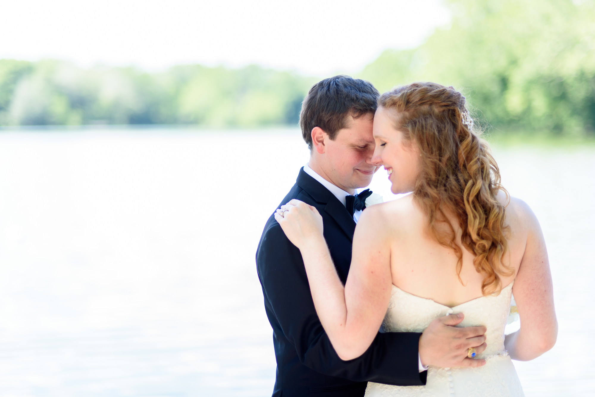 Wedding Couple on the Campus of the University of Notre Dame by St Mary's Lake