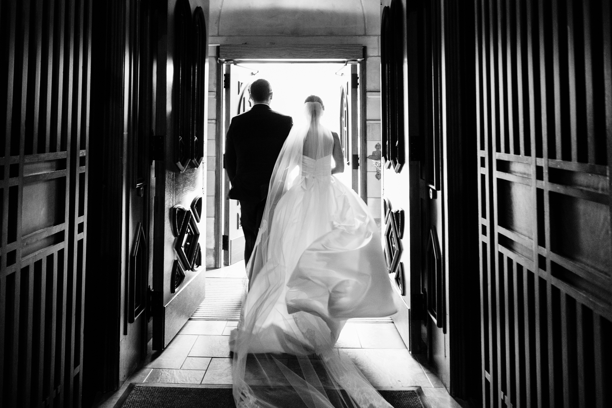 Bride & Groom exit their ceremony at the Basilica of the Sacred Heart on the campus of the University of Notre Dame