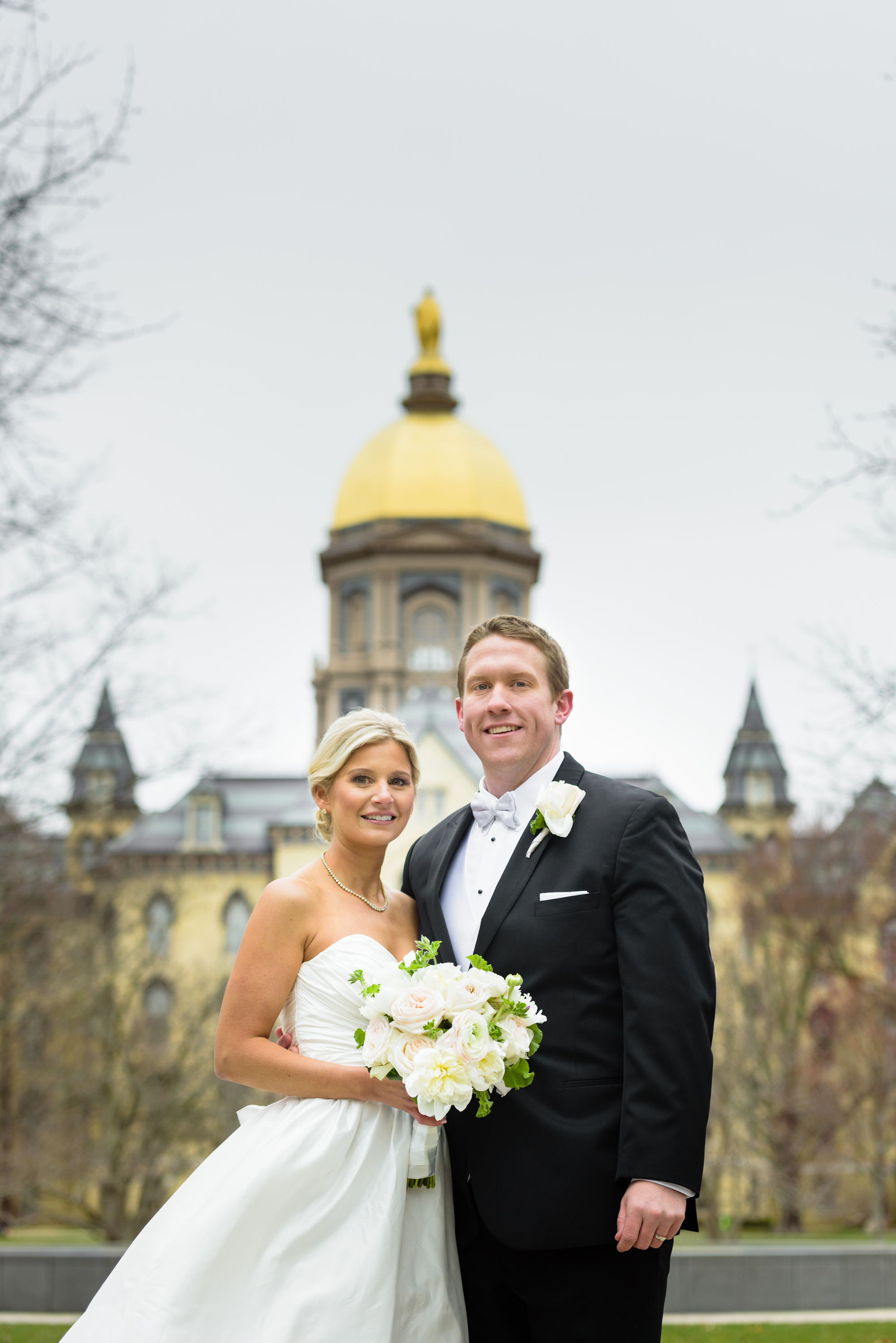 Bride & Groom in front of the Golden Dome on the campus of University of Notre Dame