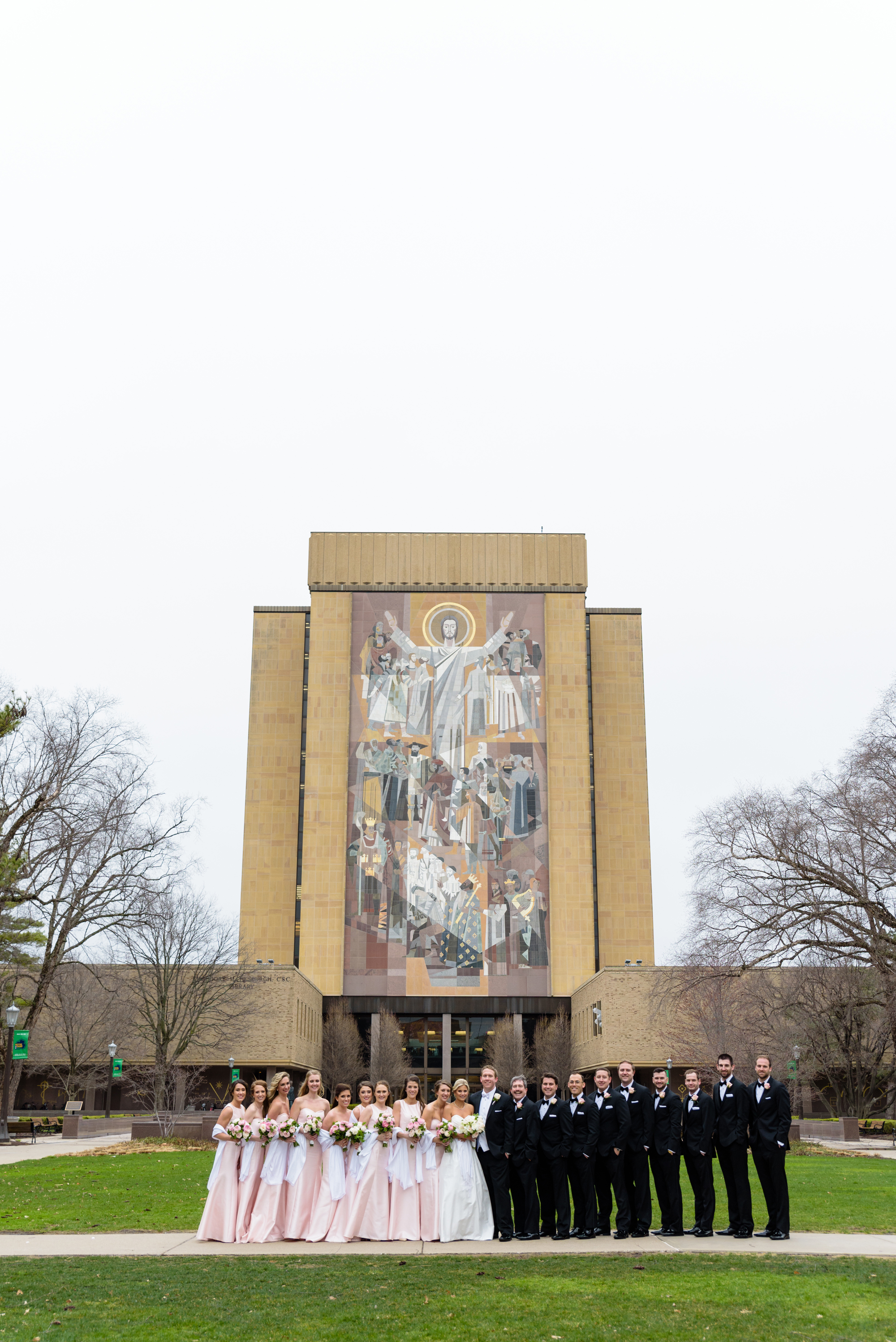 Bridal Party in front Touch Down Jesus on the campus of University of Notre Dame