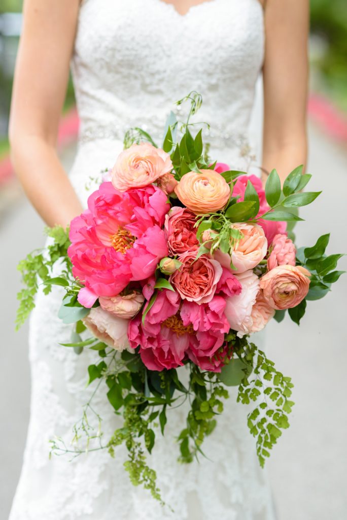 Bridal bouquet by Merry Me Events with peonies & ranunculus 