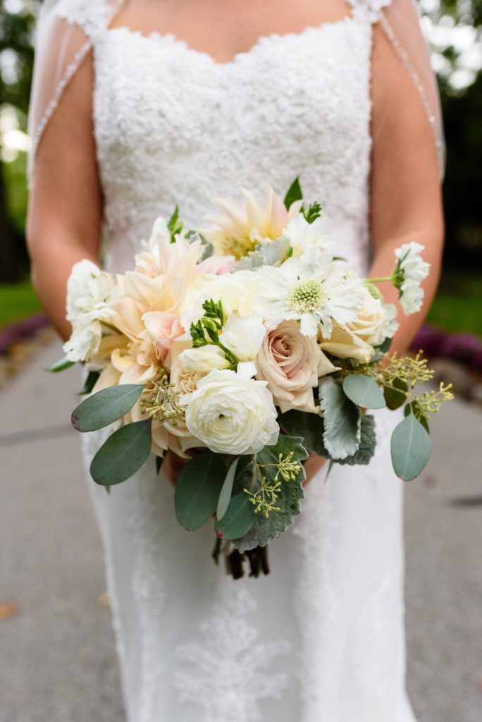 Bridal bouquet by Country Florist with dahlias, eucalyptus, & lamb’s ear