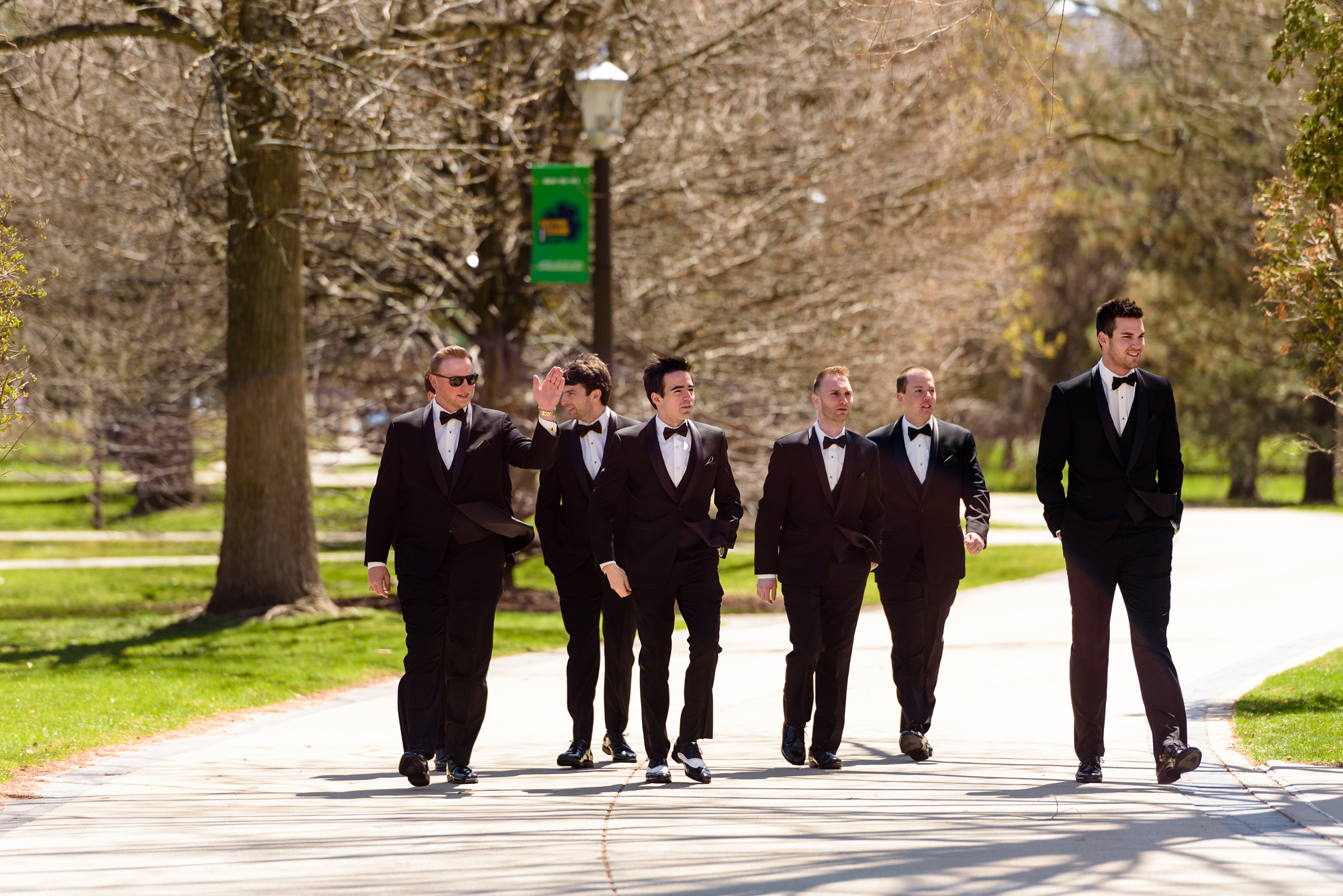 Groom walking to his ceremony at the Basilica with his groomsmen