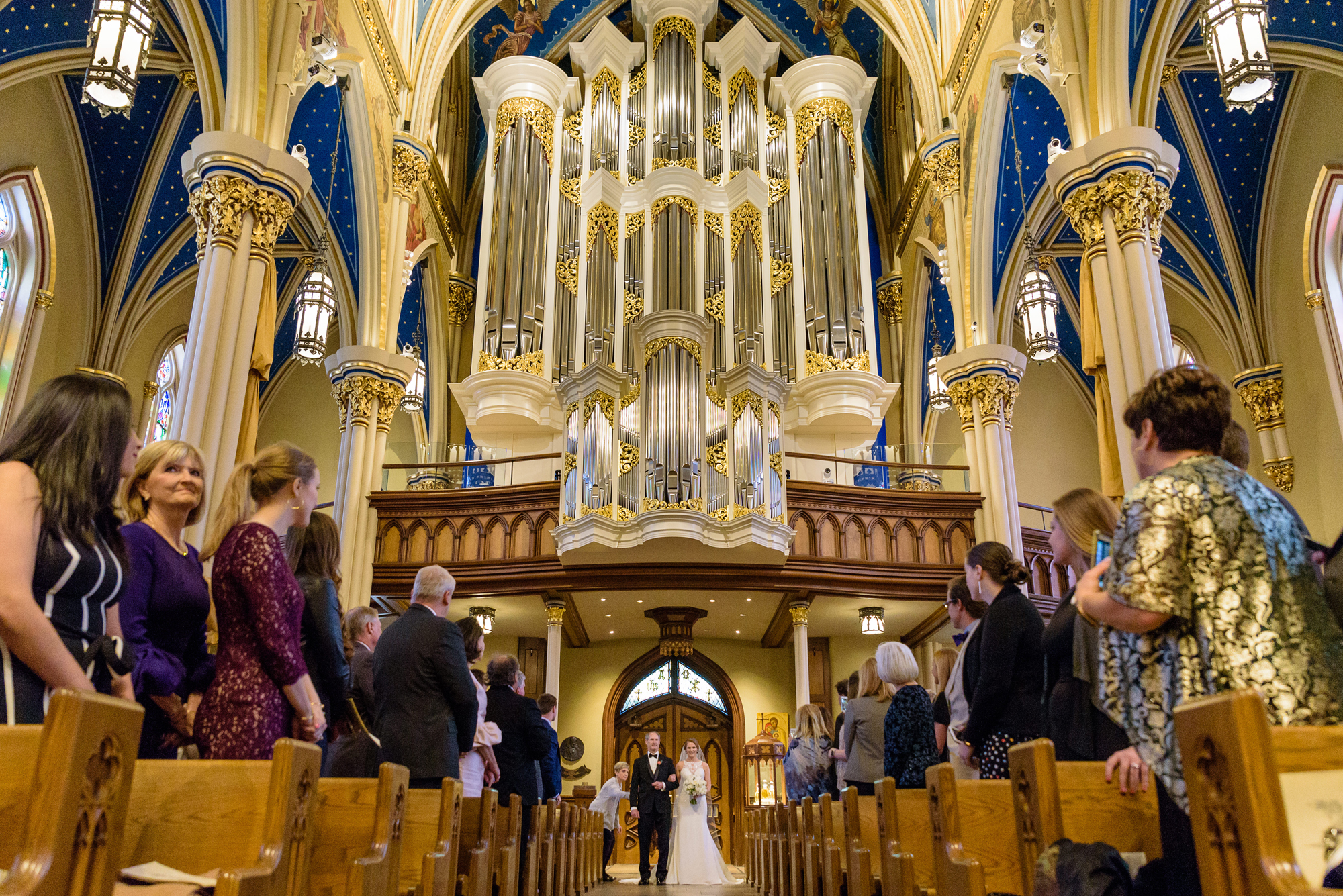 Bride getting ready to walk down the aisle for her wedding ceremony at the Basilica