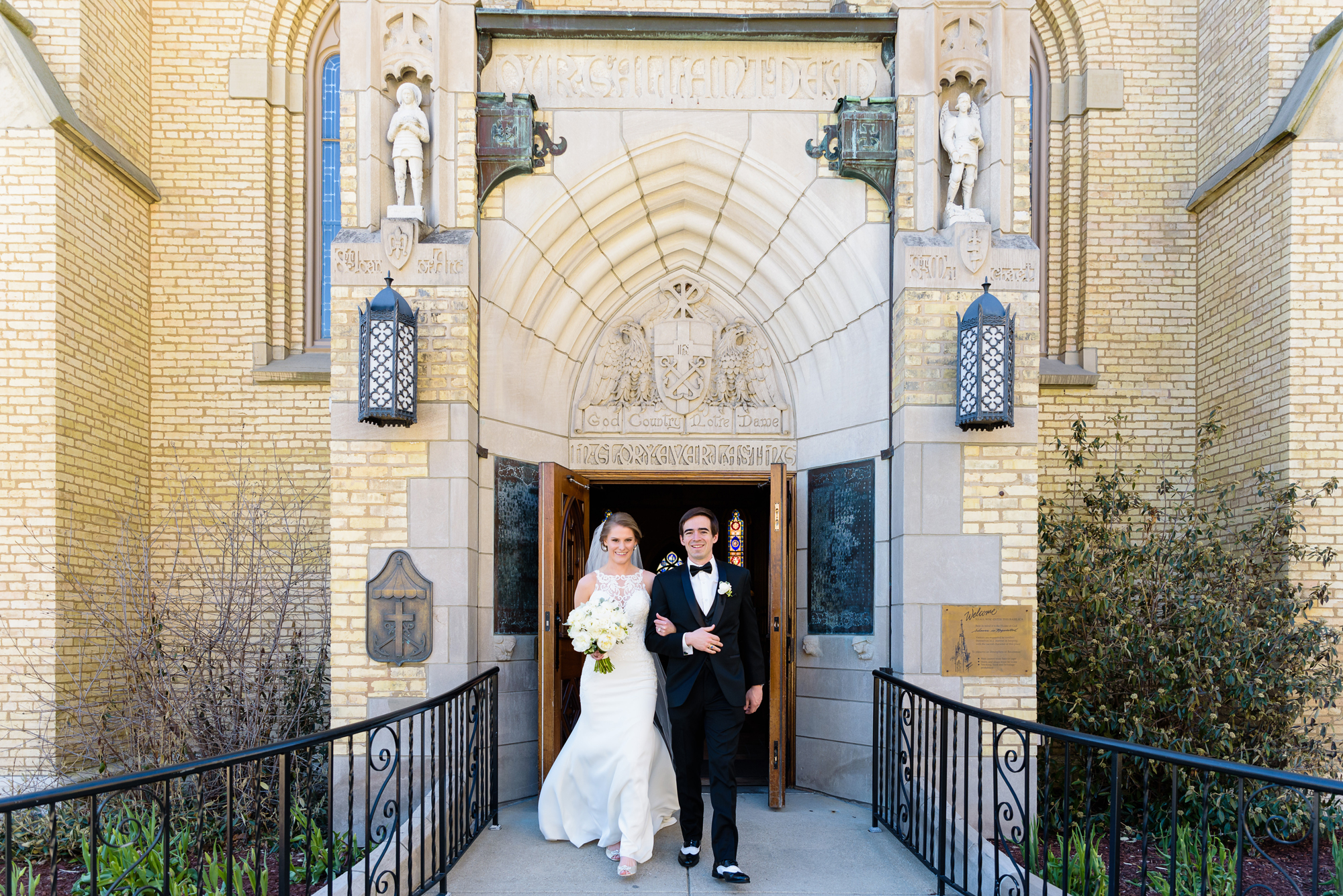 Bride & Groom leaving the Basilica at Notre Dame out God Country Door