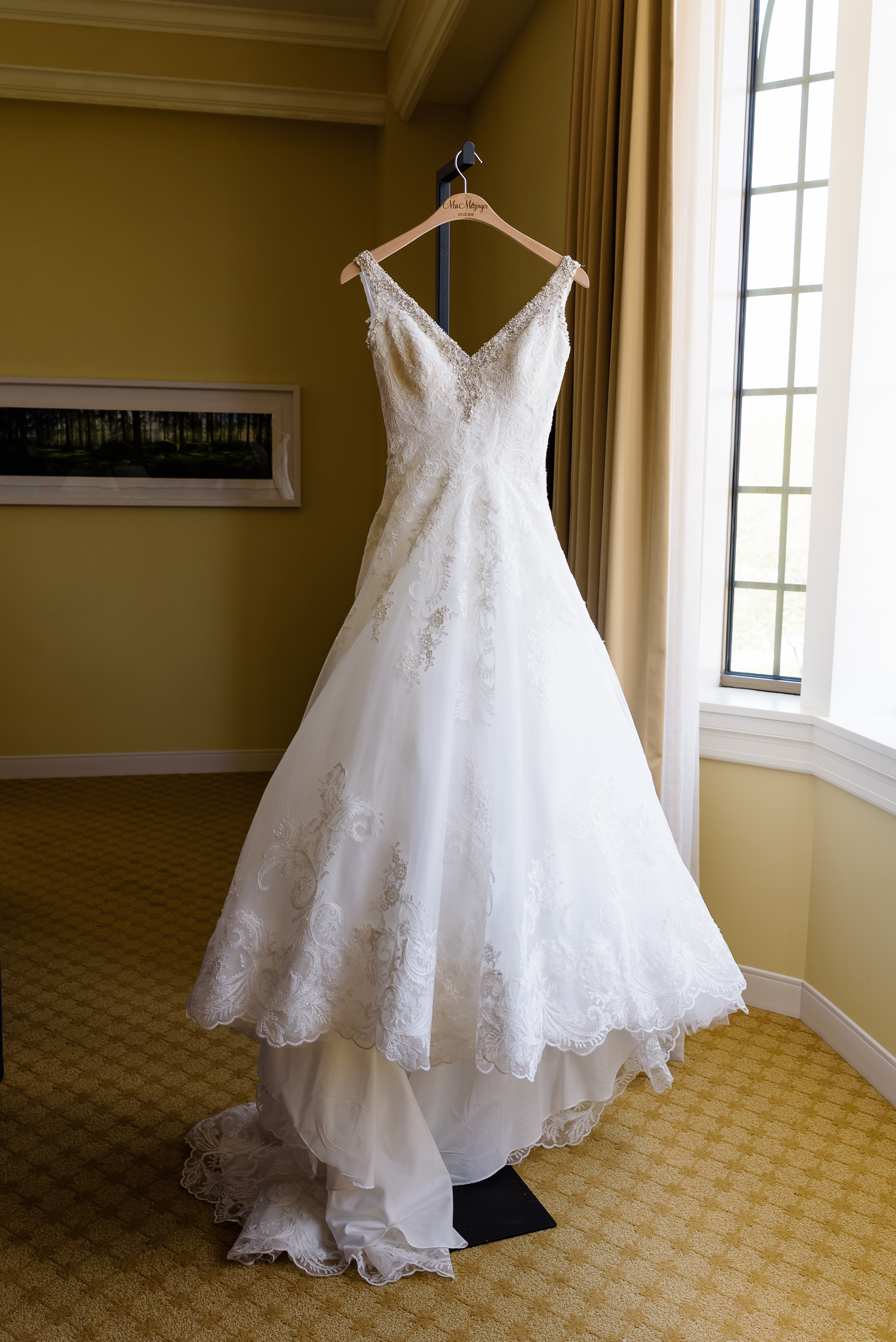 Morielle designed beaded wedding gown with a lace overlay