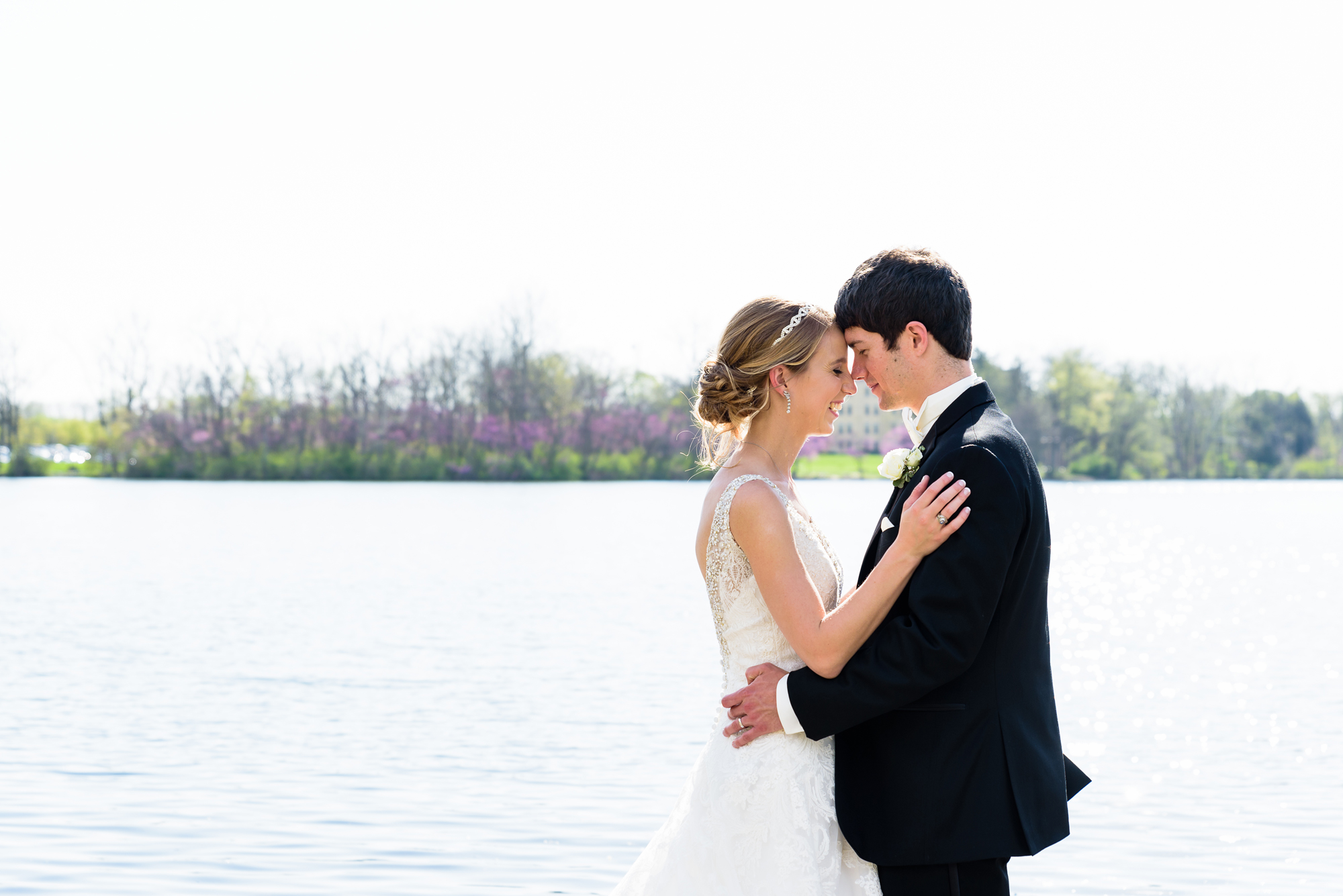 Bride & Groom by the lake at the Grotto on the campus of Notre Dame