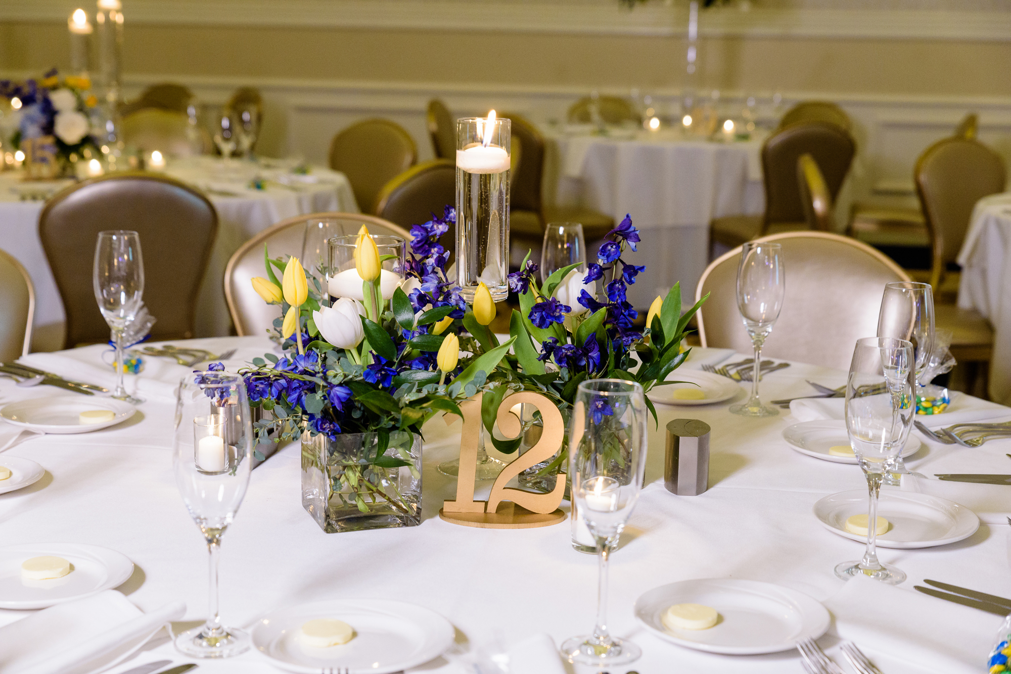 Centerpieces for a wedding reception at the Morris Inn on the campus of Notre Dame by Poppies by Polly