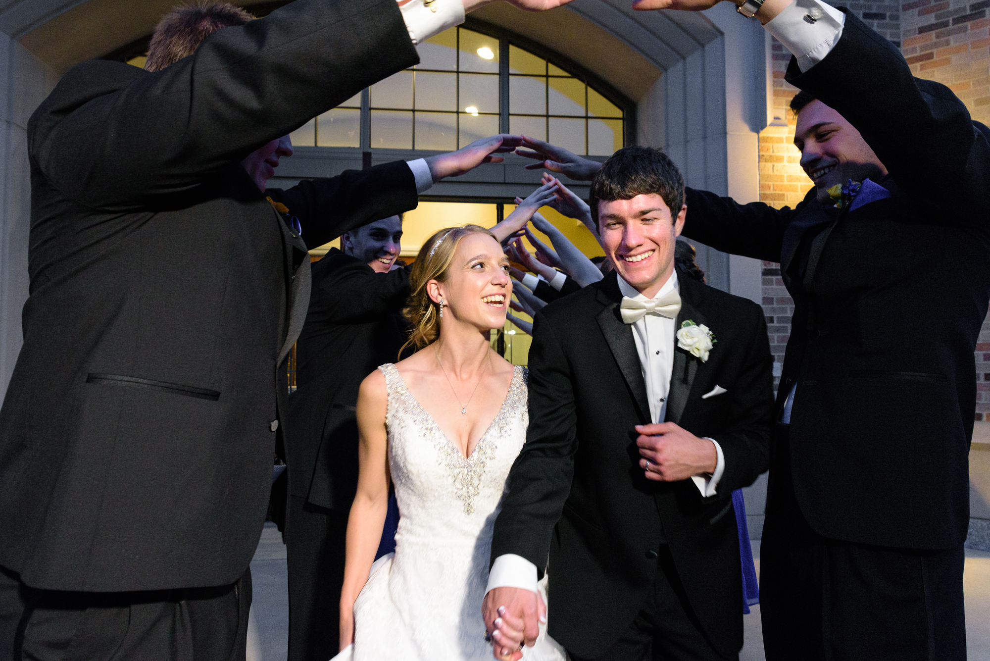 Bride & Groom leaving their wedding reception at the Morris Inn on the campus of Notre Dame