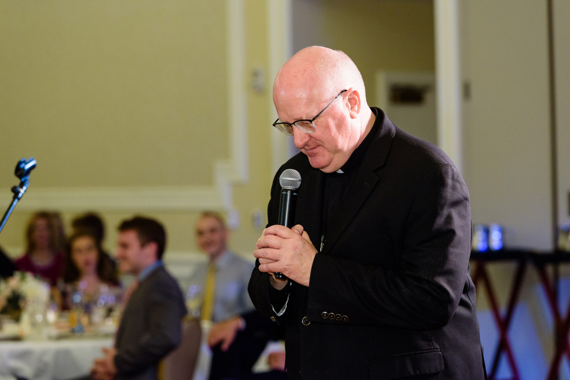 Blessing at a wedding reception at the Morris Inn on the campus of the University of Notre Dame