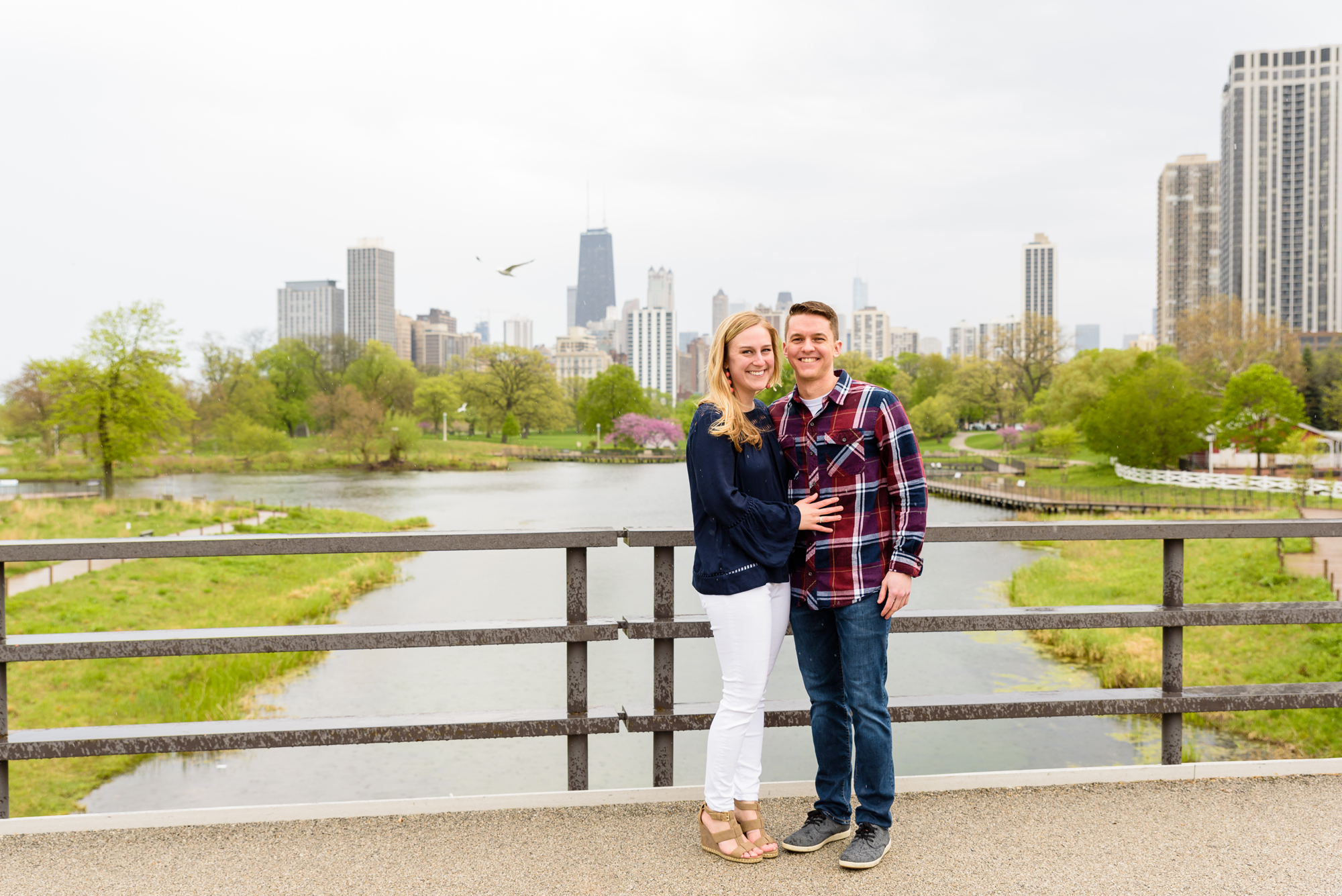 Engagement session in Lincoln Park with the view of the Chicago Skyline