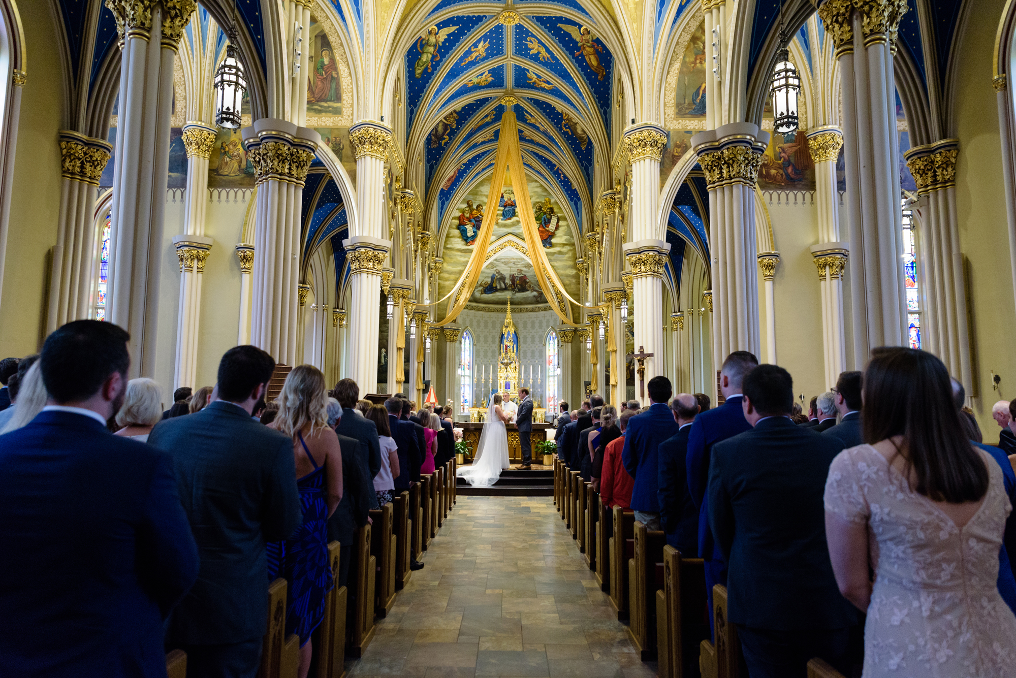 Bride & Groom at the altar at a ceremony at the Basilica of the Sacred Heart on the campus of Notre Dame
