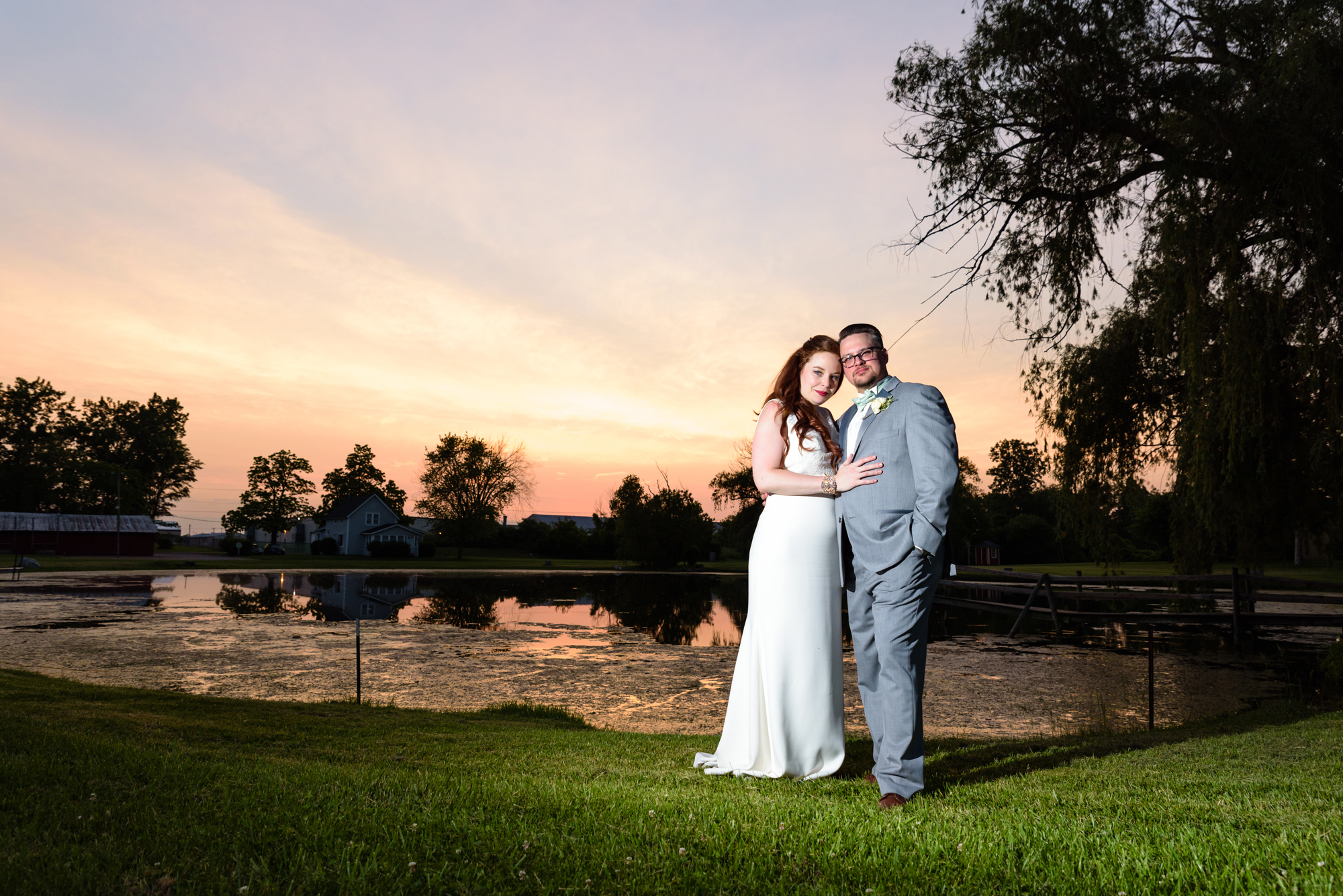 Sunset photo of a Bride & Groom at a wedding at Amish Acres