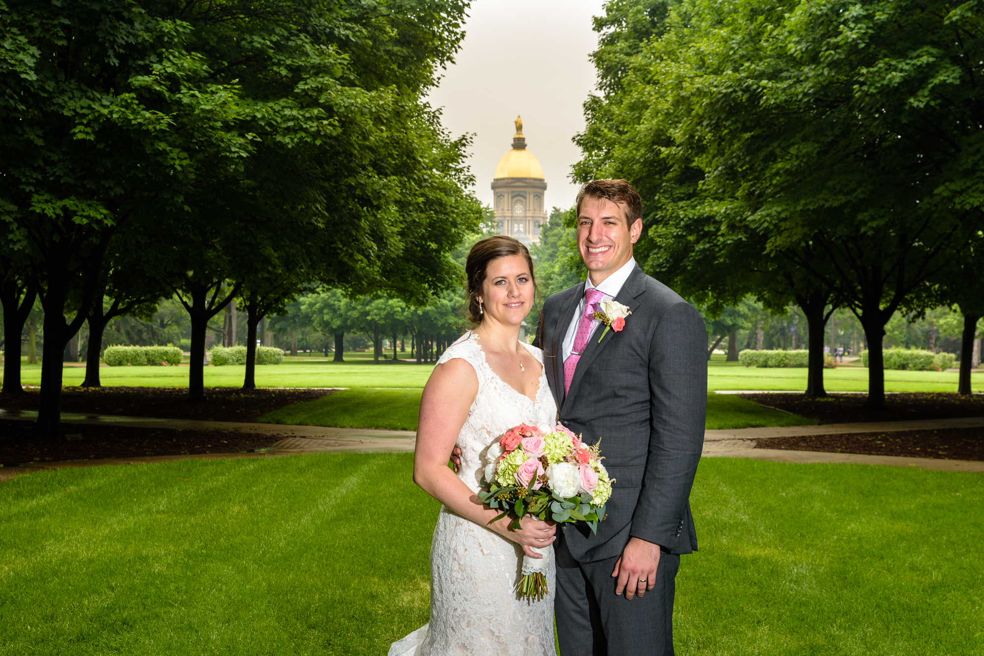 Bride & Groom in front of the Golden Dome after their wedding ceremony at the Basilica of the Sacred Heart on the campus of University of Notre Dame