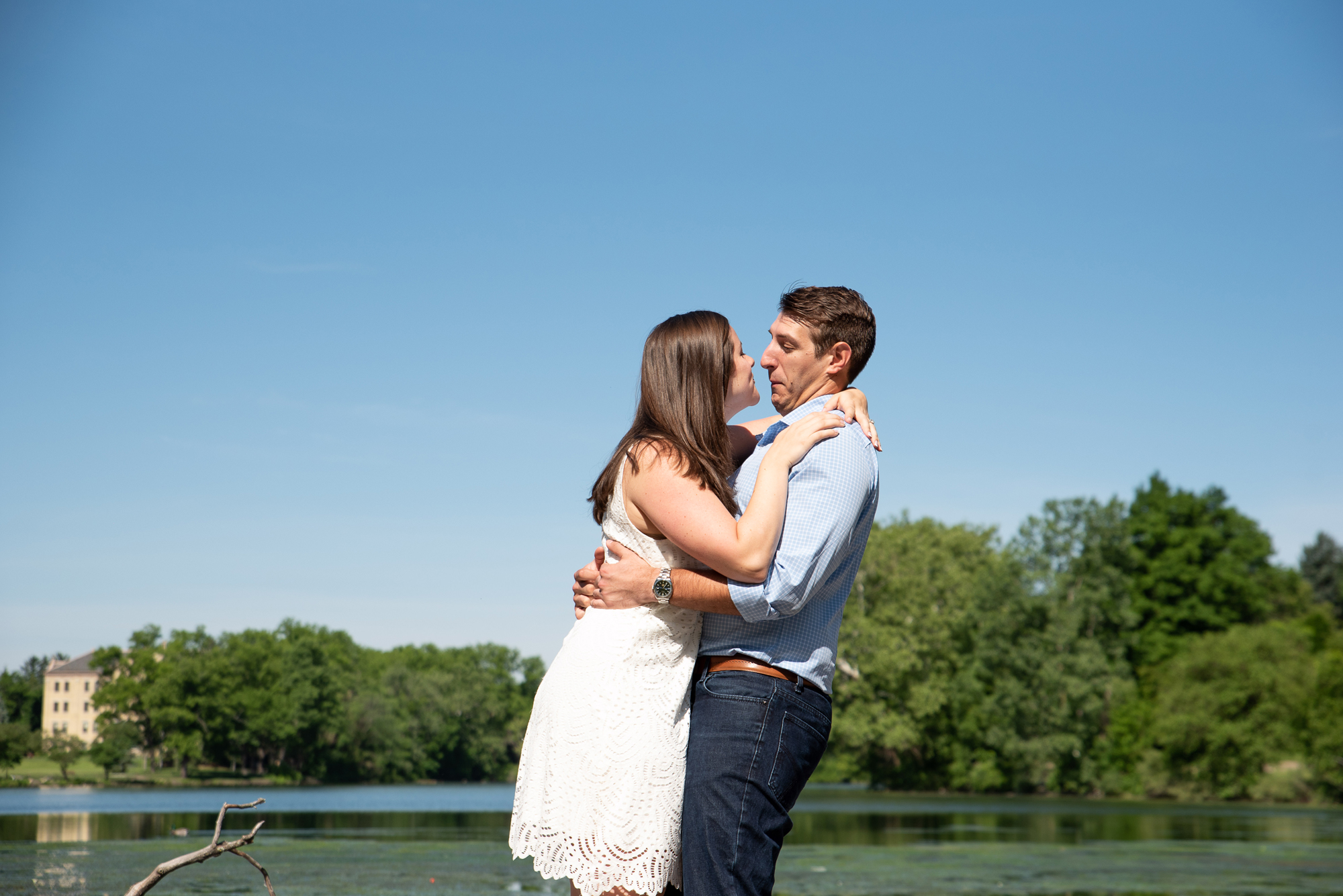 Couple in front of St Mary's Lake on the campus of University of Notre Dame