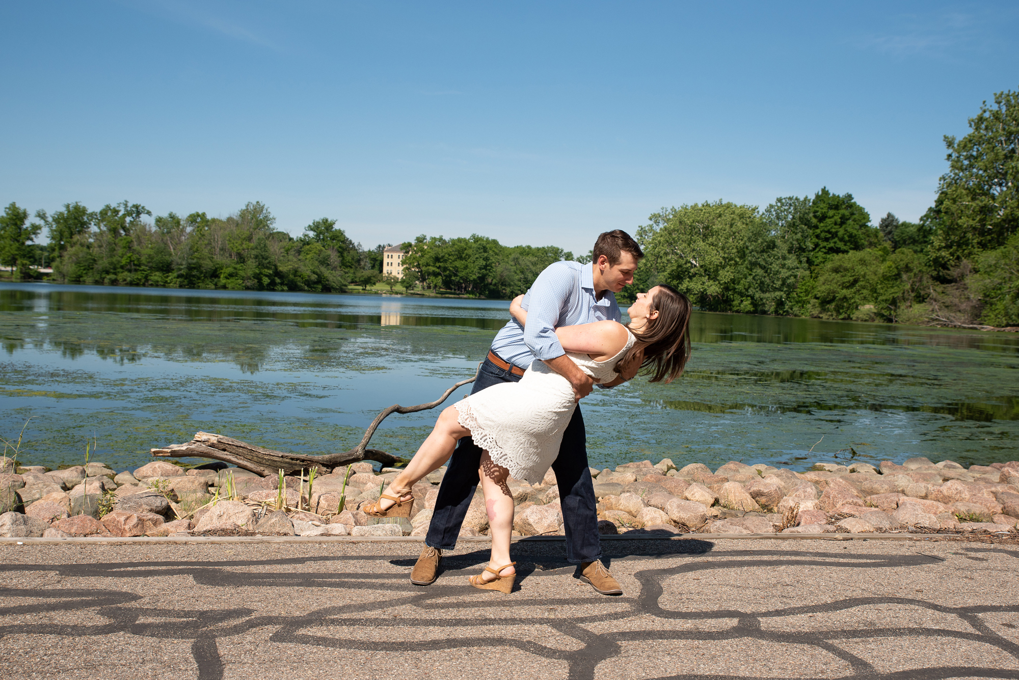 Couple in front of St Mary's Lake on the campus of University of Notre Dame