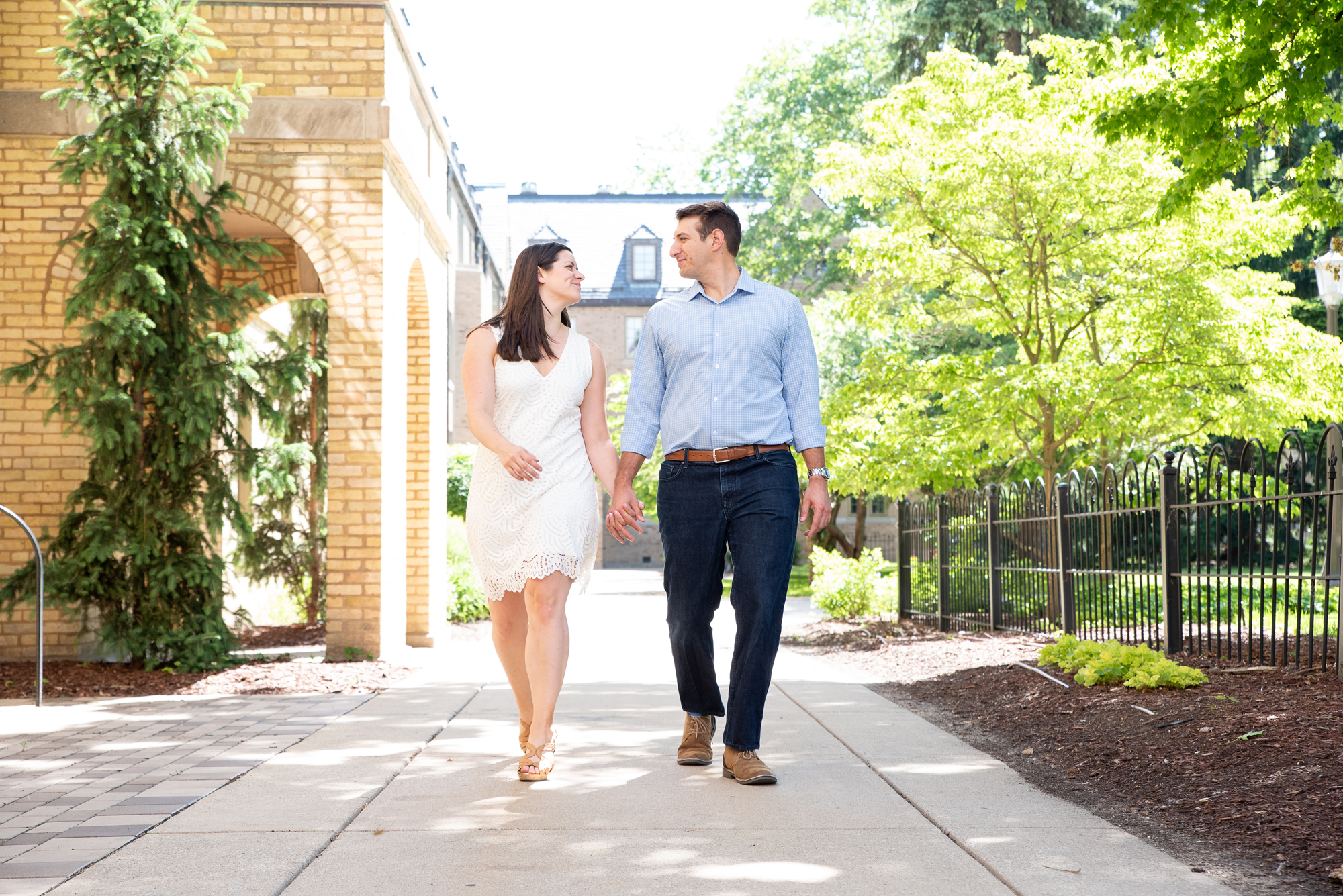 Couple in front of St Edward's Hall on the campus of University of Notre Dame