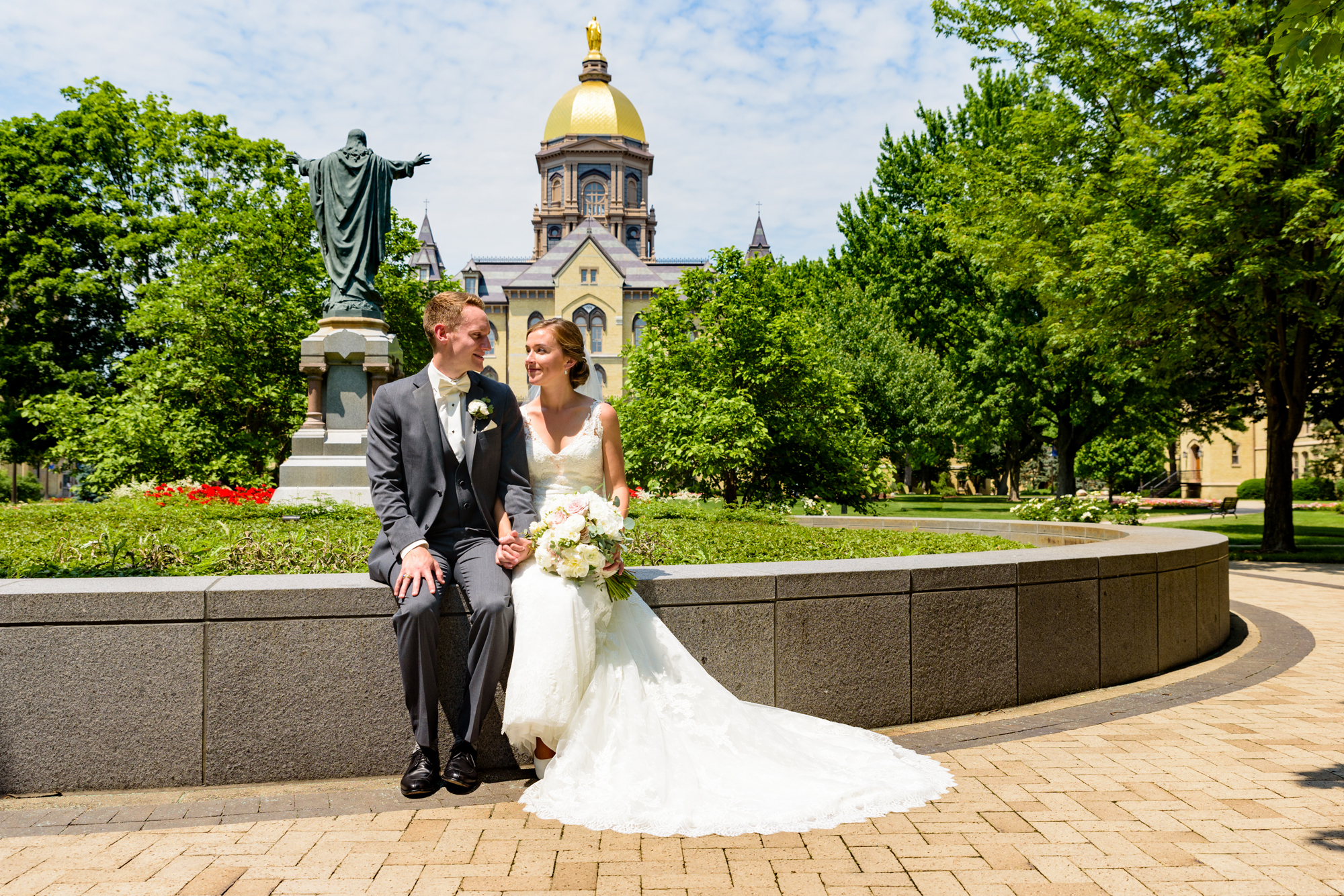 Bride & Groom in front of the Golden Dome on God Quad on the campus of the University of Notre Dame