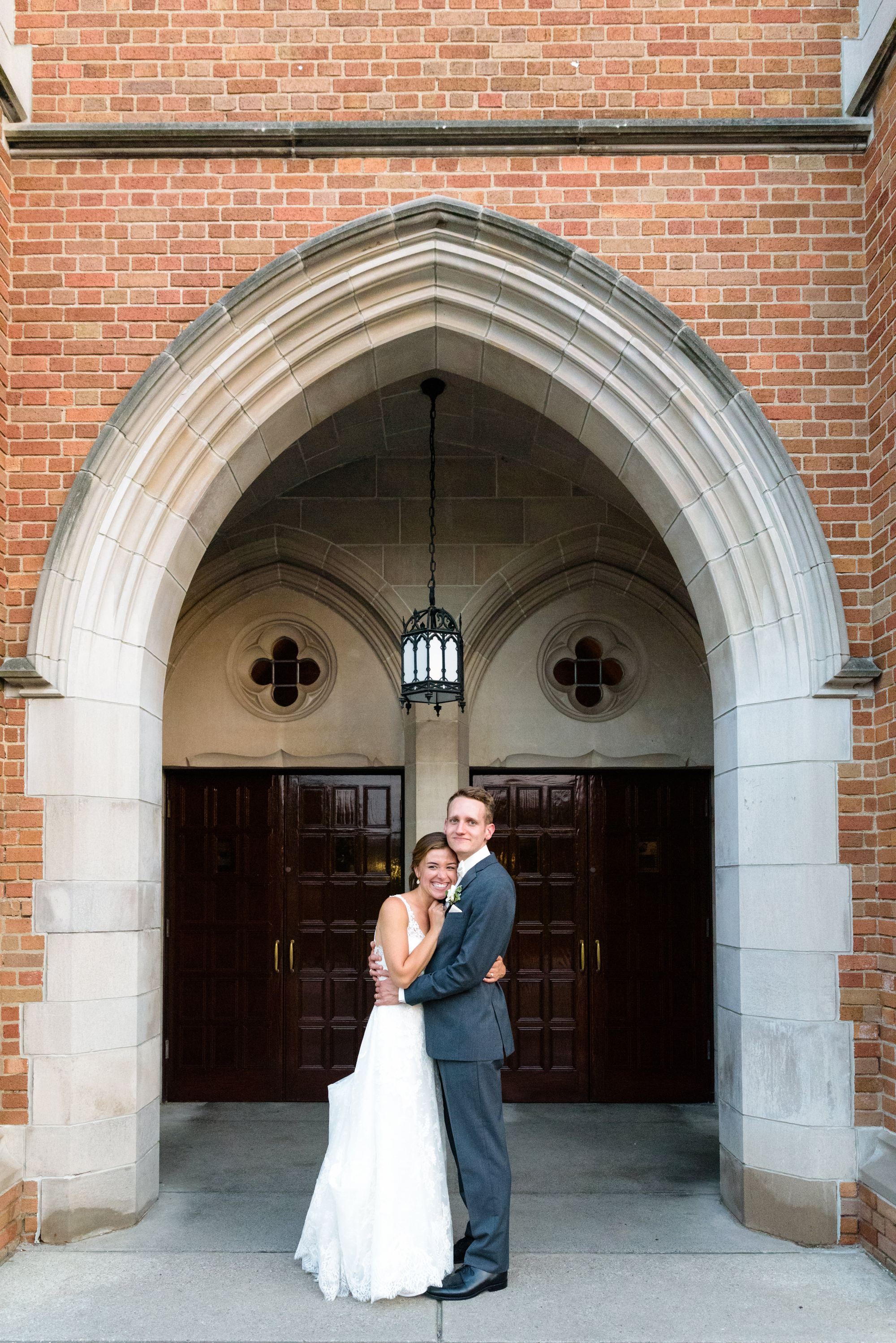 Bride & Groom at the end of the night of their Wedding reception in South Dining Hall on the campus of the University of Notre Dame