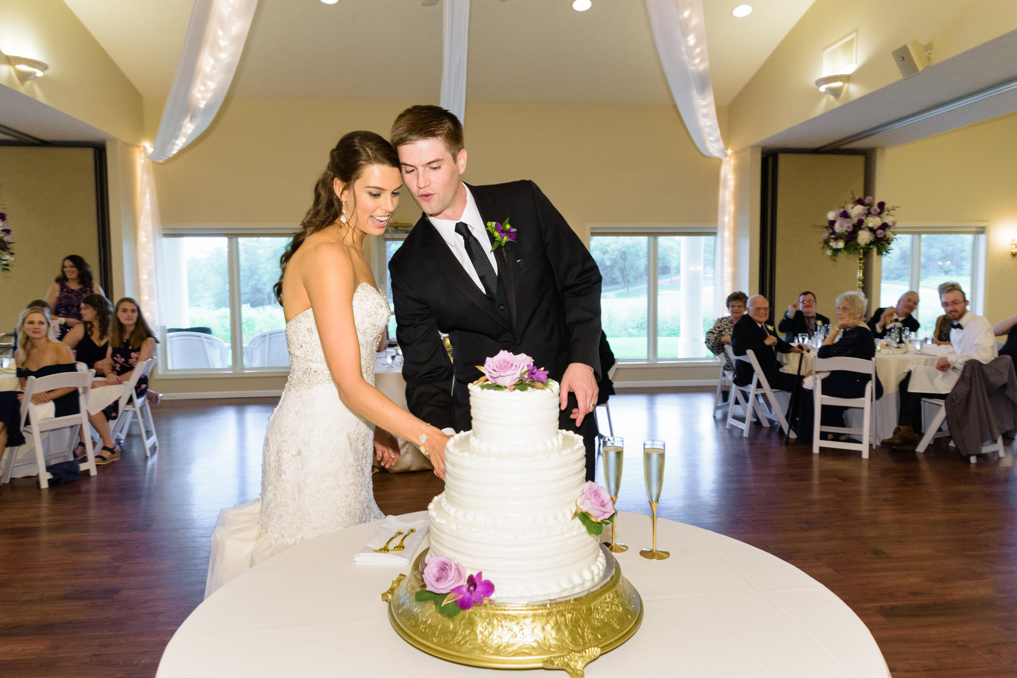 Bride & Groom’s cake cutting at a Wedding Reception at Blue Heron at Blackthorn