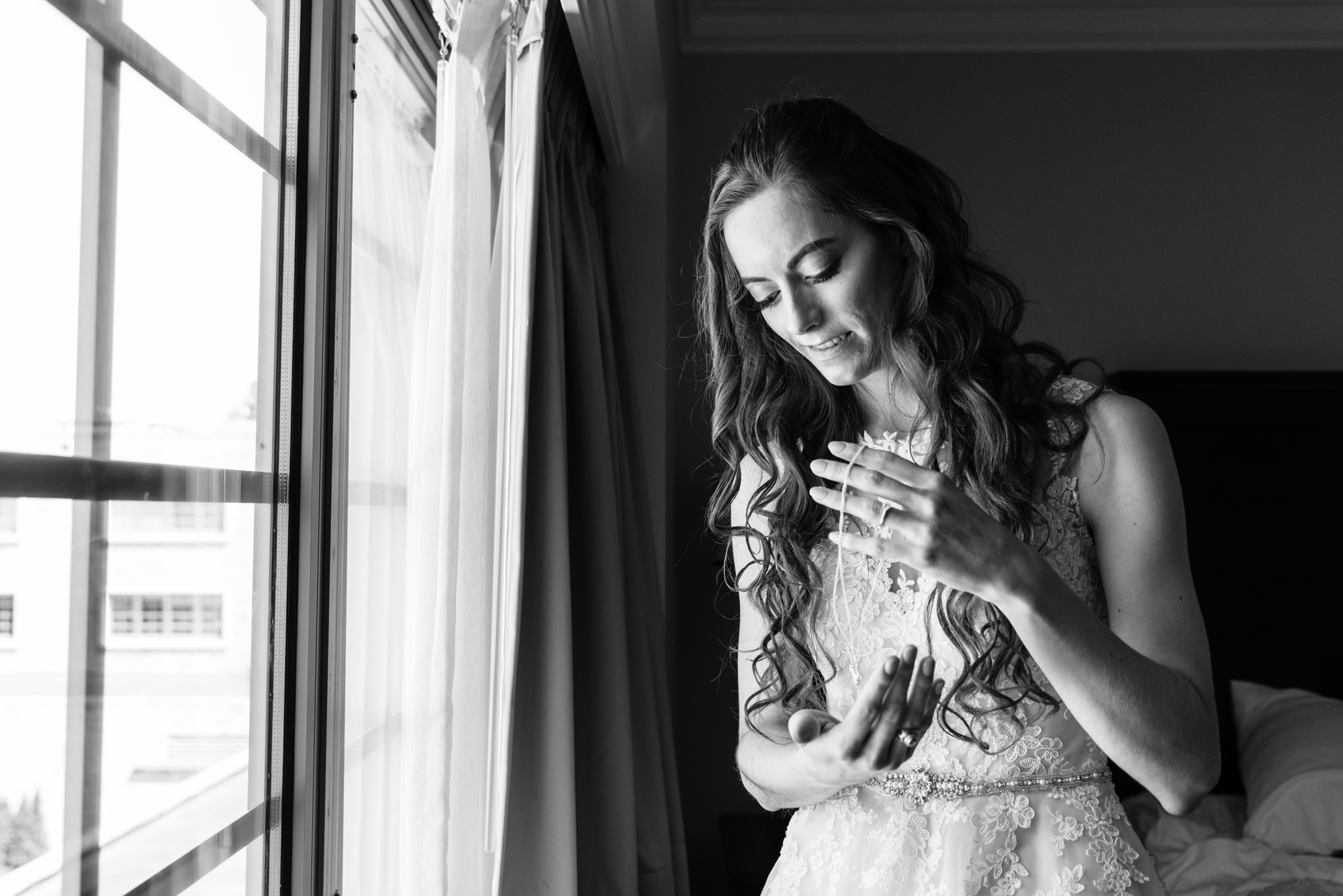 Bride getting ready for her wedding ceremony at the Basilica of the Sacred Heart on the campus of the University of Notre Dame