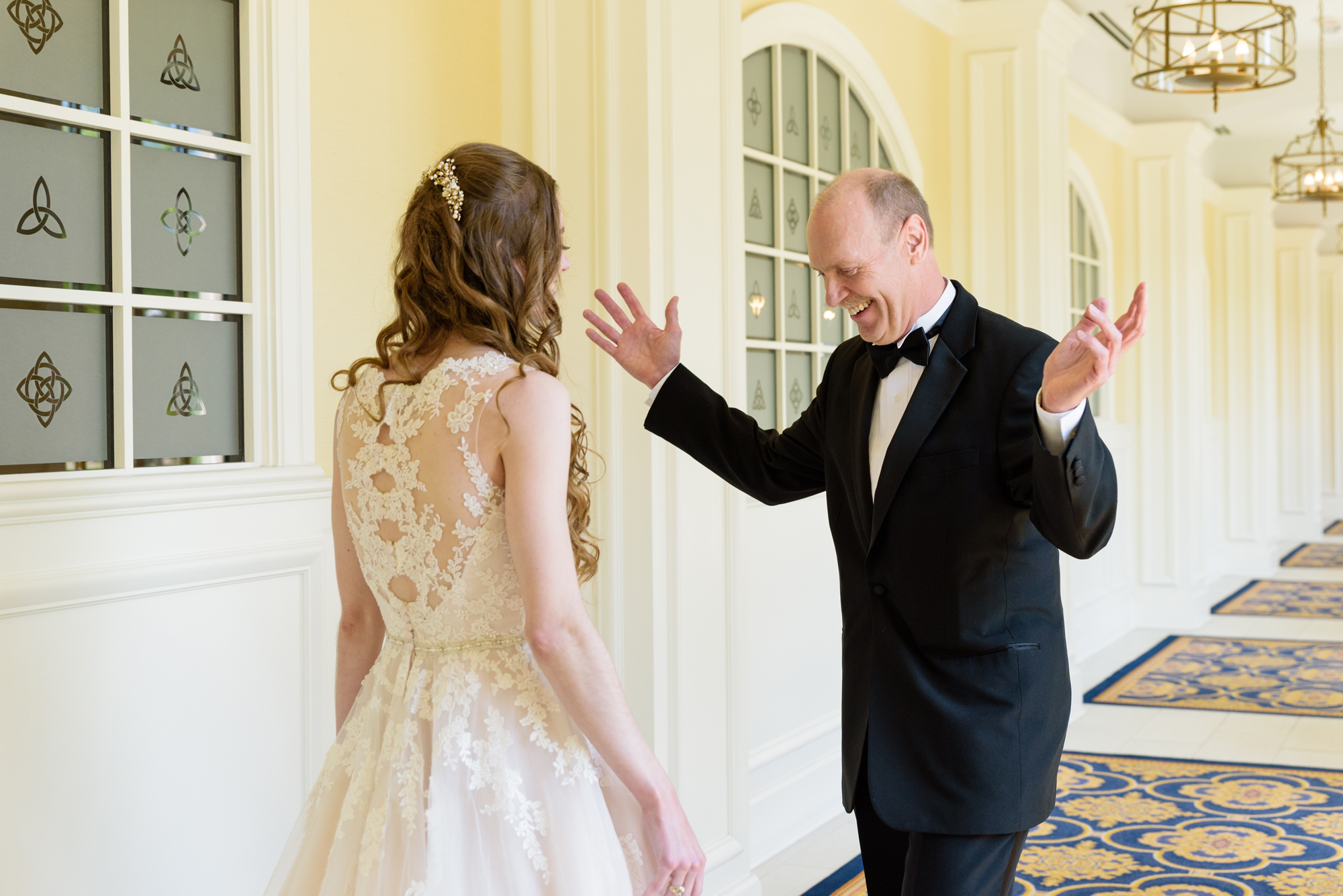 Daddy Daughter first look before a wedding ceremony at the Basilica of the Sacred Heart on the campus of the University of Notre Dame