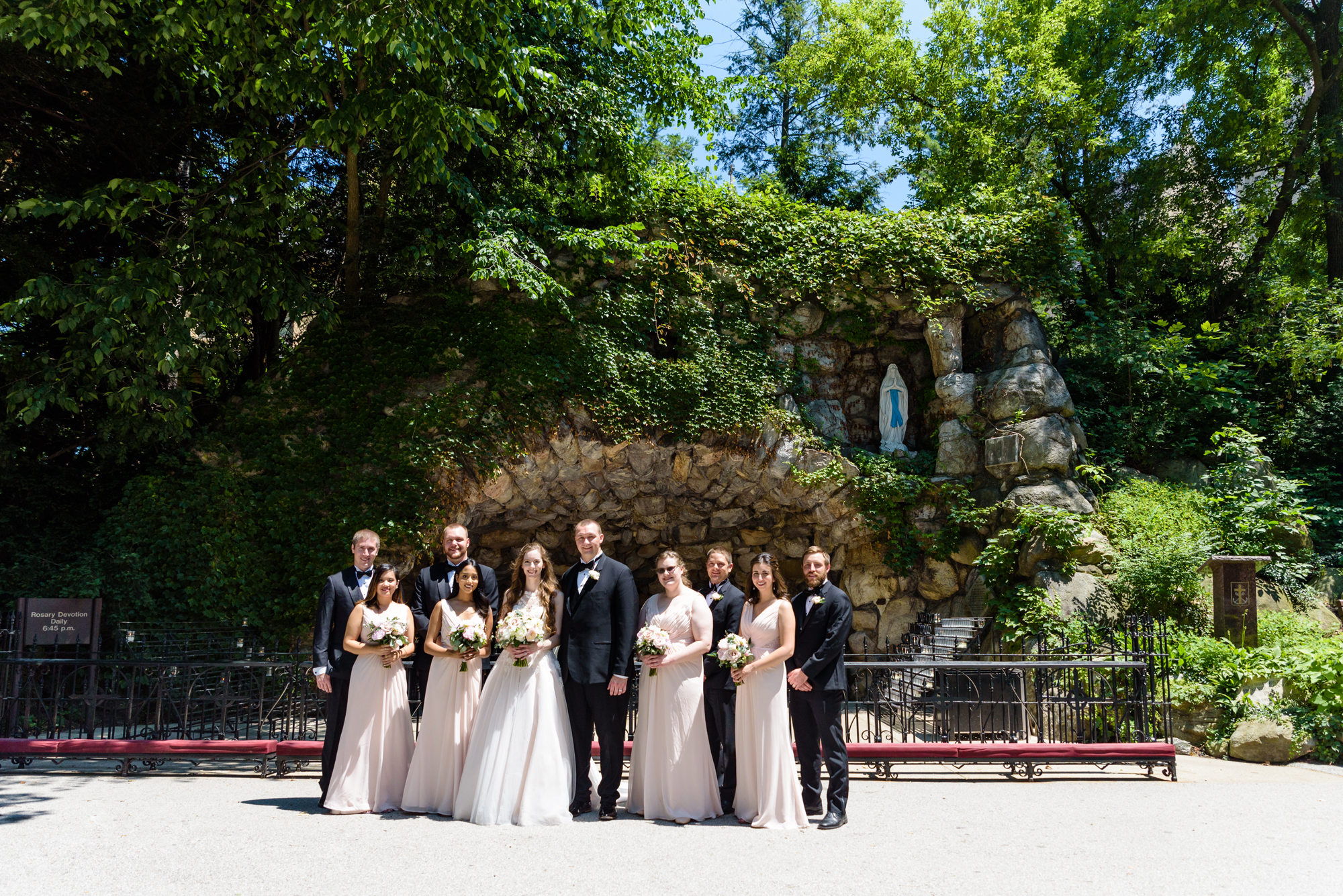 Bridal Party at the Grotto after a wedding ceremony at the Basilica of the Sacred Heart on the campus of the University of Notre Dame