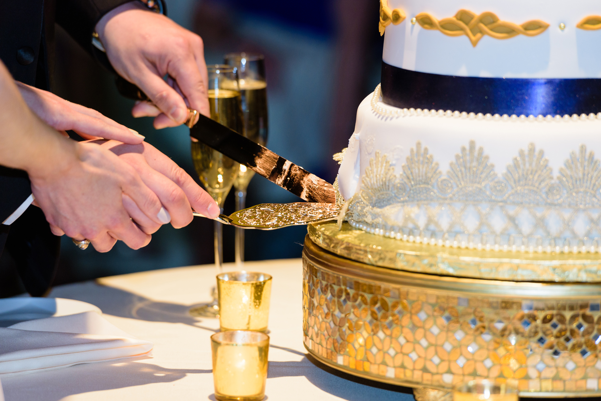 Bride & Groom’s cake cutting at a Wedding Reception at Palais Royale