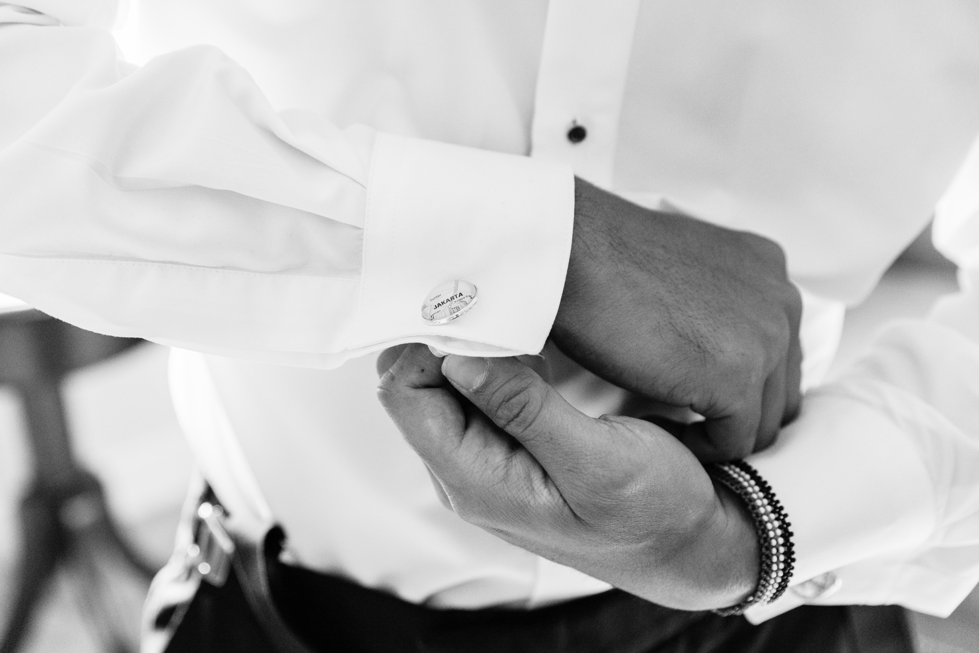 Groom getting ready for his wedding ceremony at the Basilica of the Sacred Heart on the campus of the University of Notre Dame