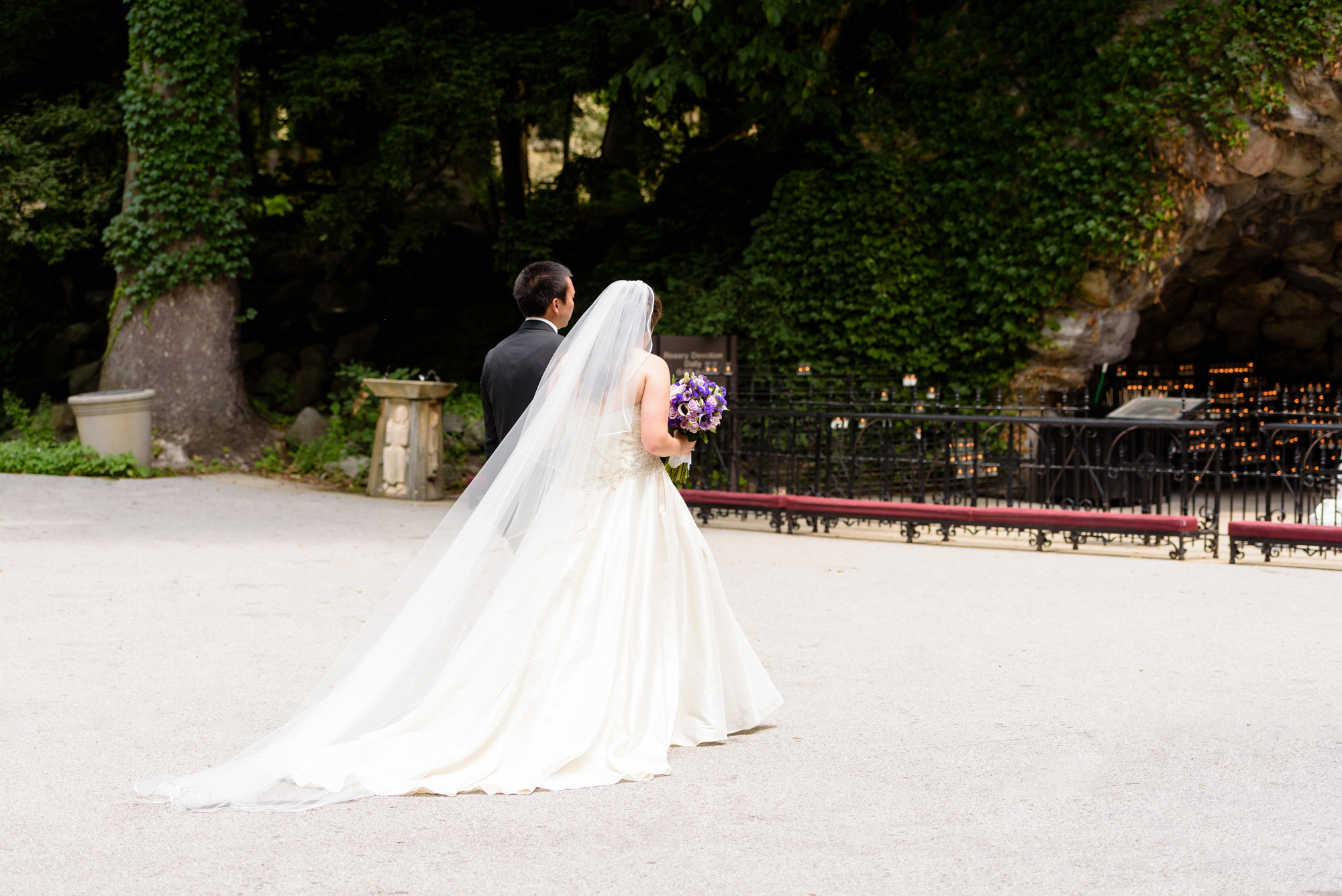 Bride & Groom at the Grotto before their wedding ceremony at the Basilica of the Sacred Heart on the campus of the University of Notre Dame