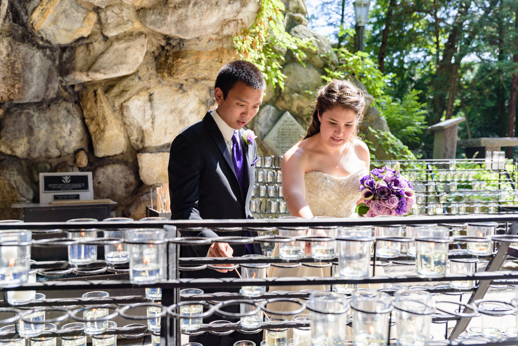 Bride & Groom at the Grotto after their wedding ceremony at the Basilica of the Sacred Heart on the campus of the University of Notre Dame