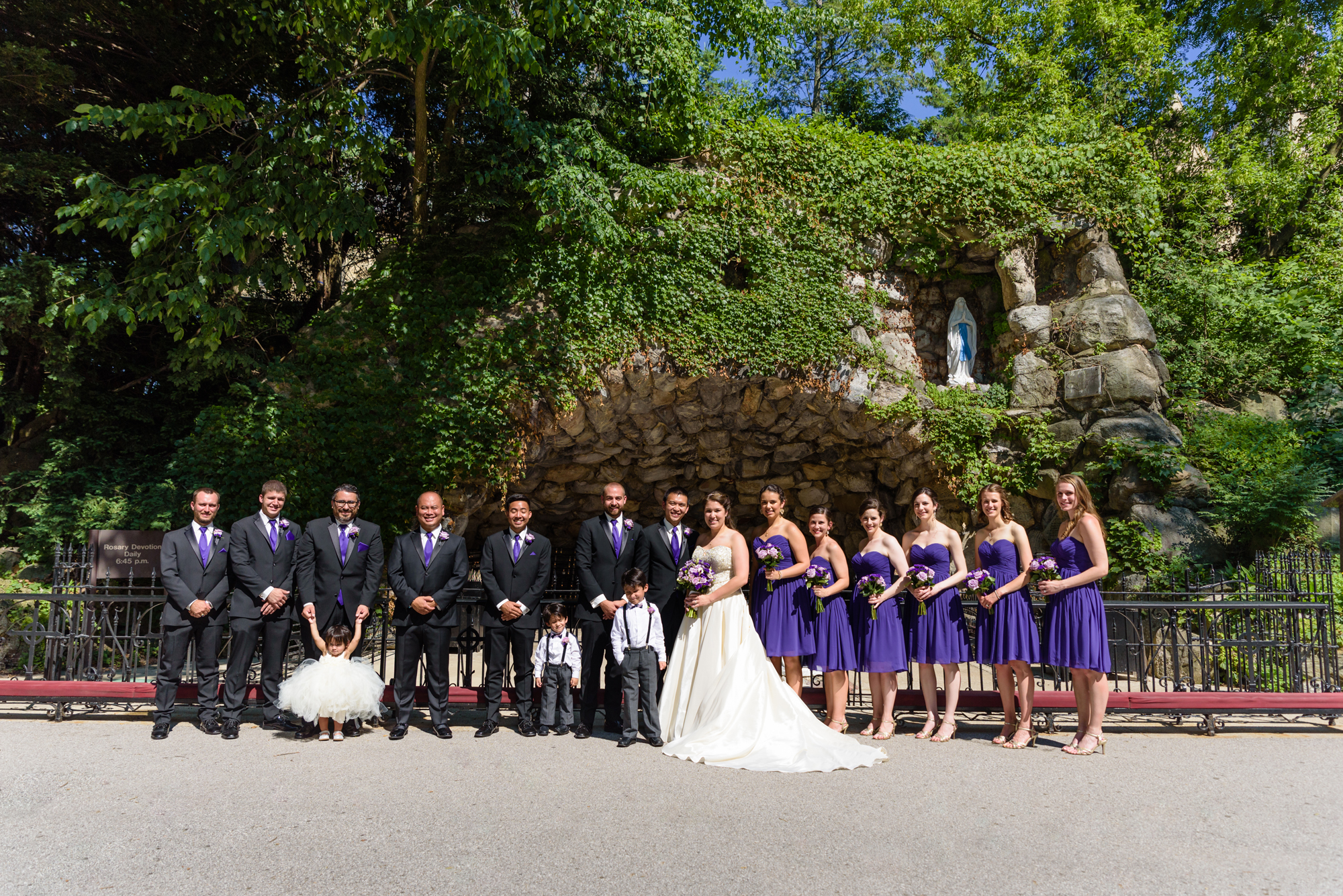 Bridal Party at the Grotto after a wedding ceremony at the Basilica of the Sacred Heart on the campus of the University of Notre Dame