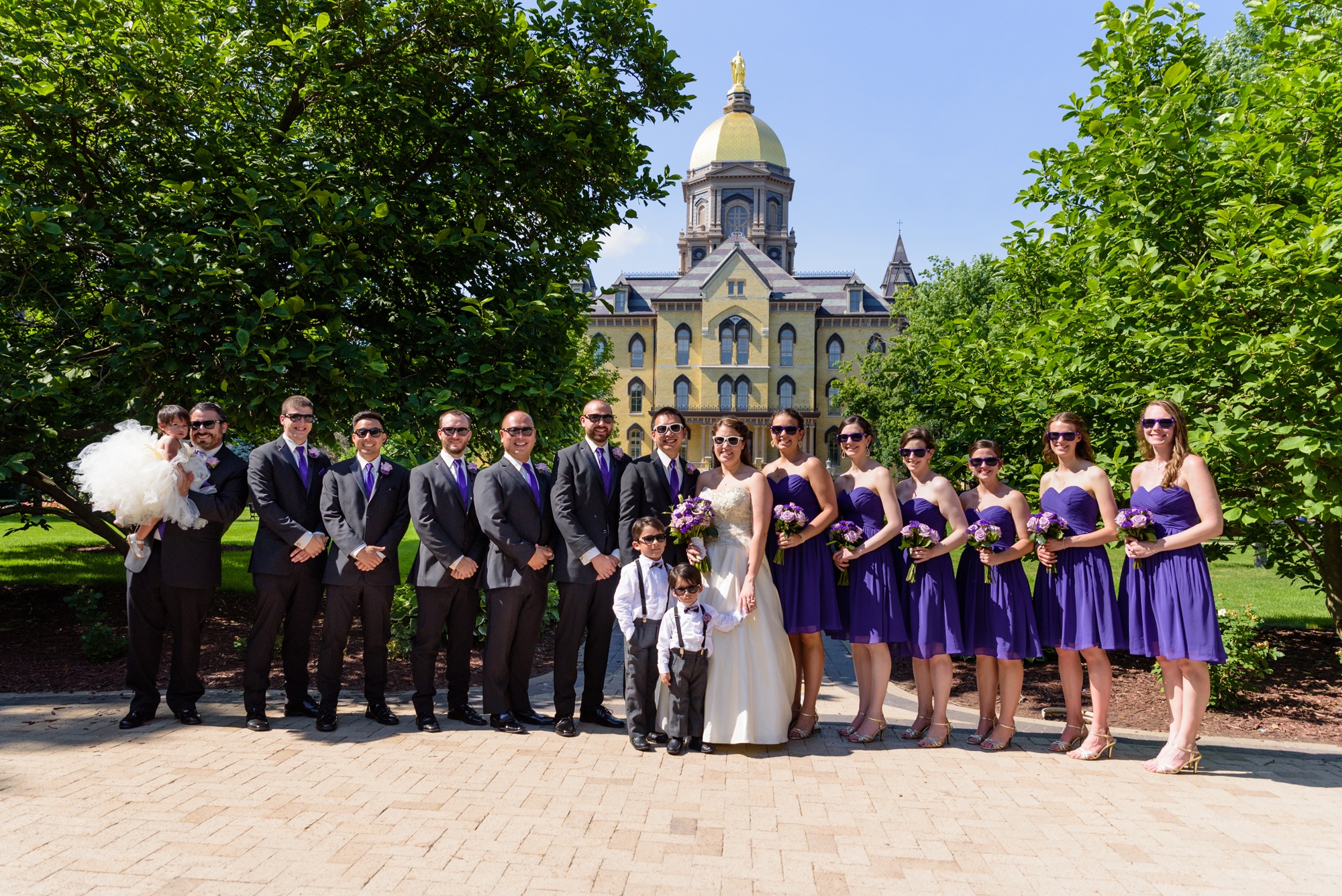 Bridal Party at the Golden Dome after a wedding ceremony at the Basilica of the Sacred Heart on the campus of the University of Notre Dame