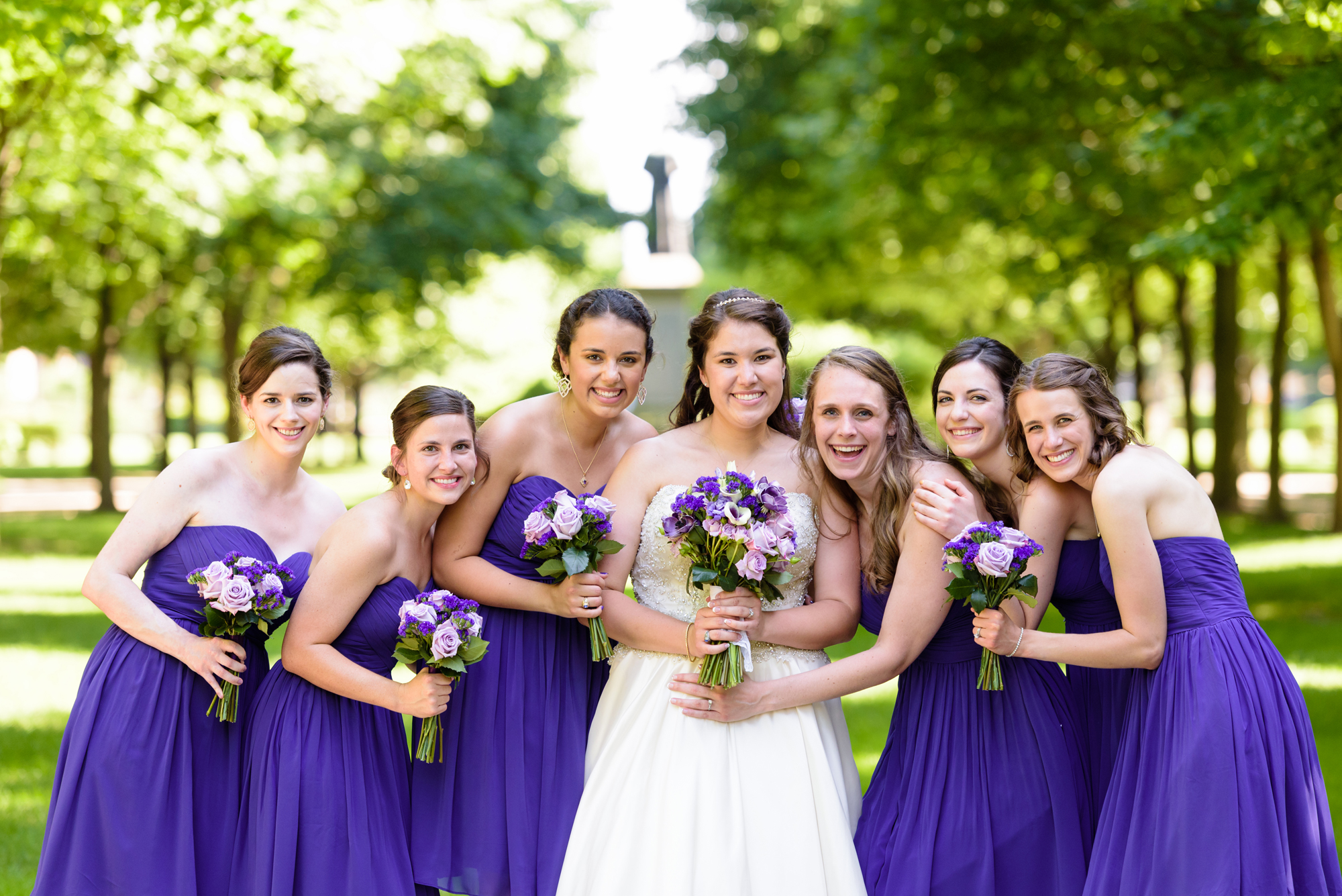 Bridesmaids on God Quad after their wedding ceremony at the Basilica of the Sacred Heart on the campus of the University of Notre Dame