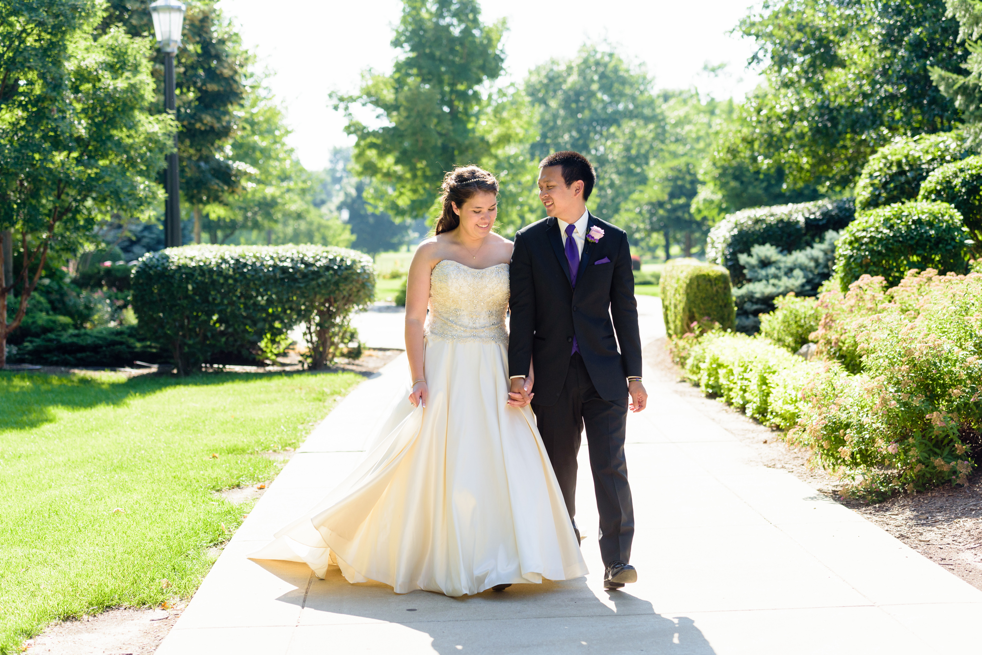 Bride & Groom on South Quad after their wedding ceremony at the Basilica of the Sacred Heart on the campus of the University of Notre Dame