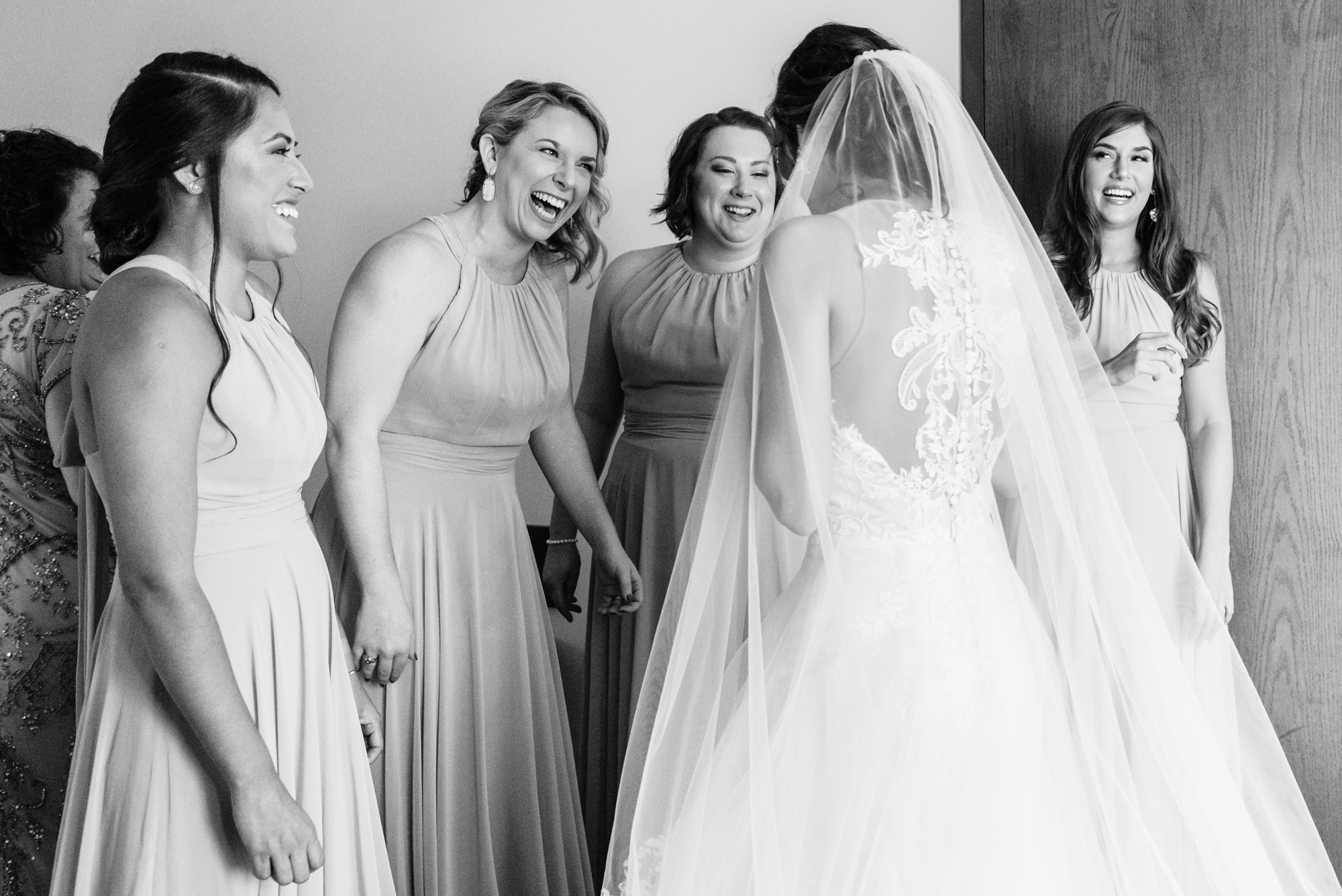 Bridesmaid reveal before a wedding ceremony at the Basilica of the Sacred Heart on the campus of the University of Notre Dame