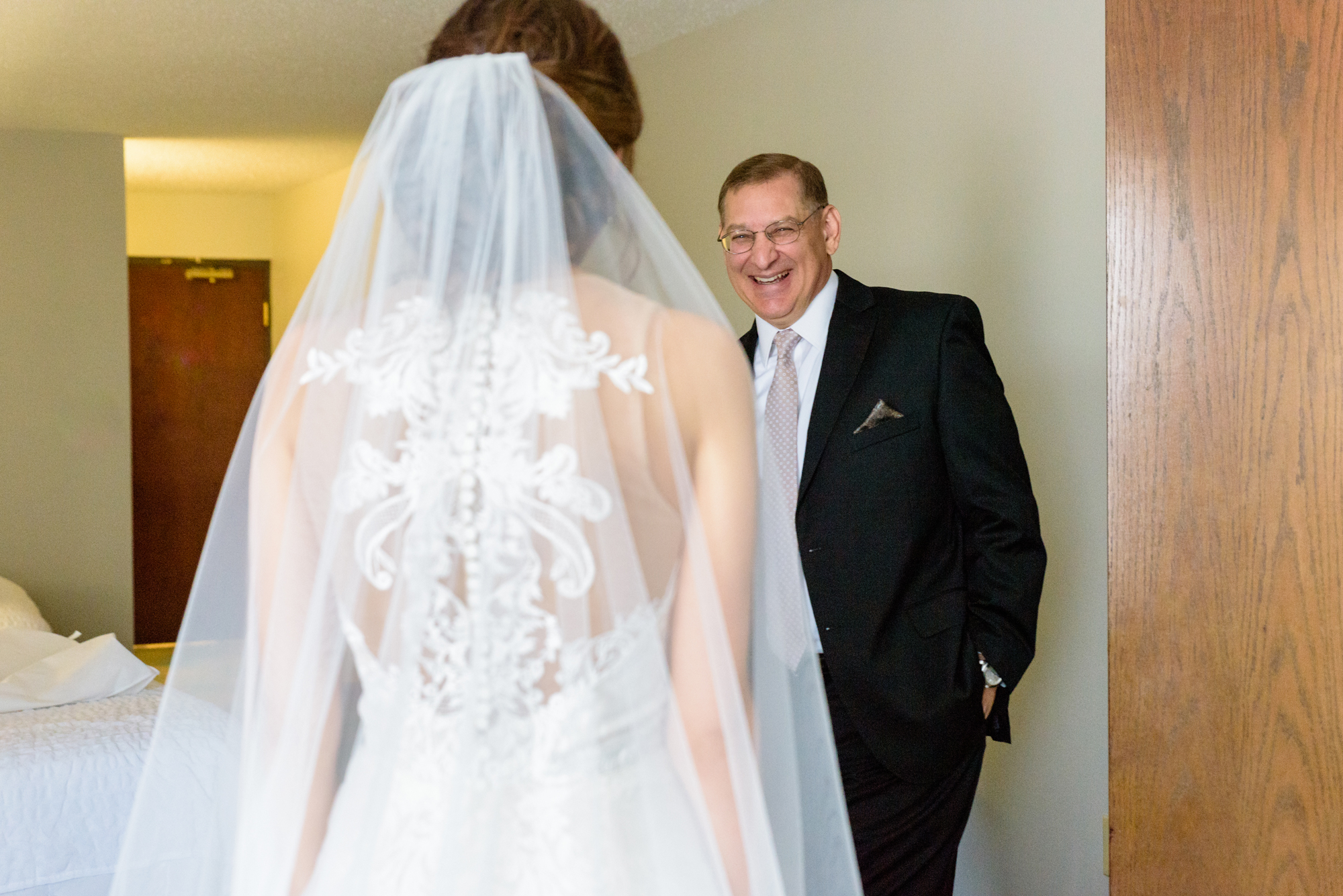 Daddy Daughter first look before a wedding ceremony at the Basilica of the Sacred Heart on the campus of the University of Notre Dame