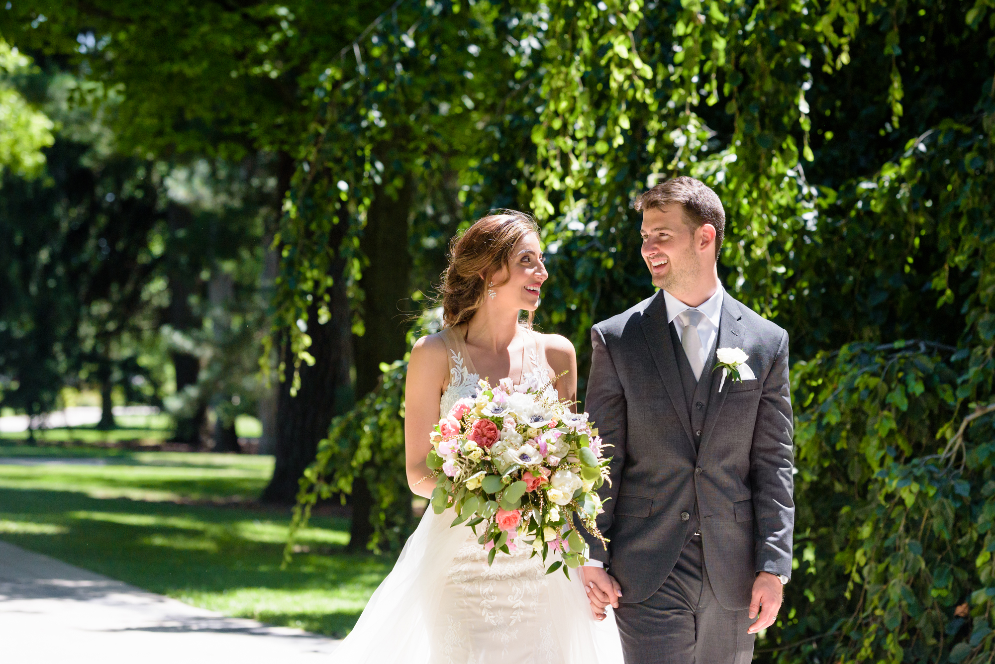 Bridal Party in front of an exotic California inspired tree after a wedding ceremony at the Basilica of the Sacred Heart on the campus of the University of Notre Dame