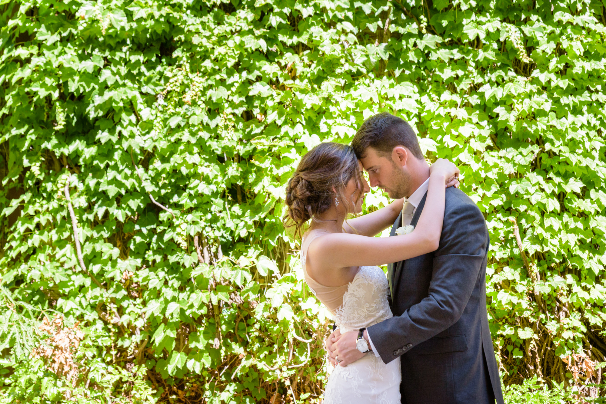 Bride & Groom outside of Fitzpatrick School of Engineering after their wedding ceremony at the Basilica of the Sacred Heart on the campus of the University of Notre Dame