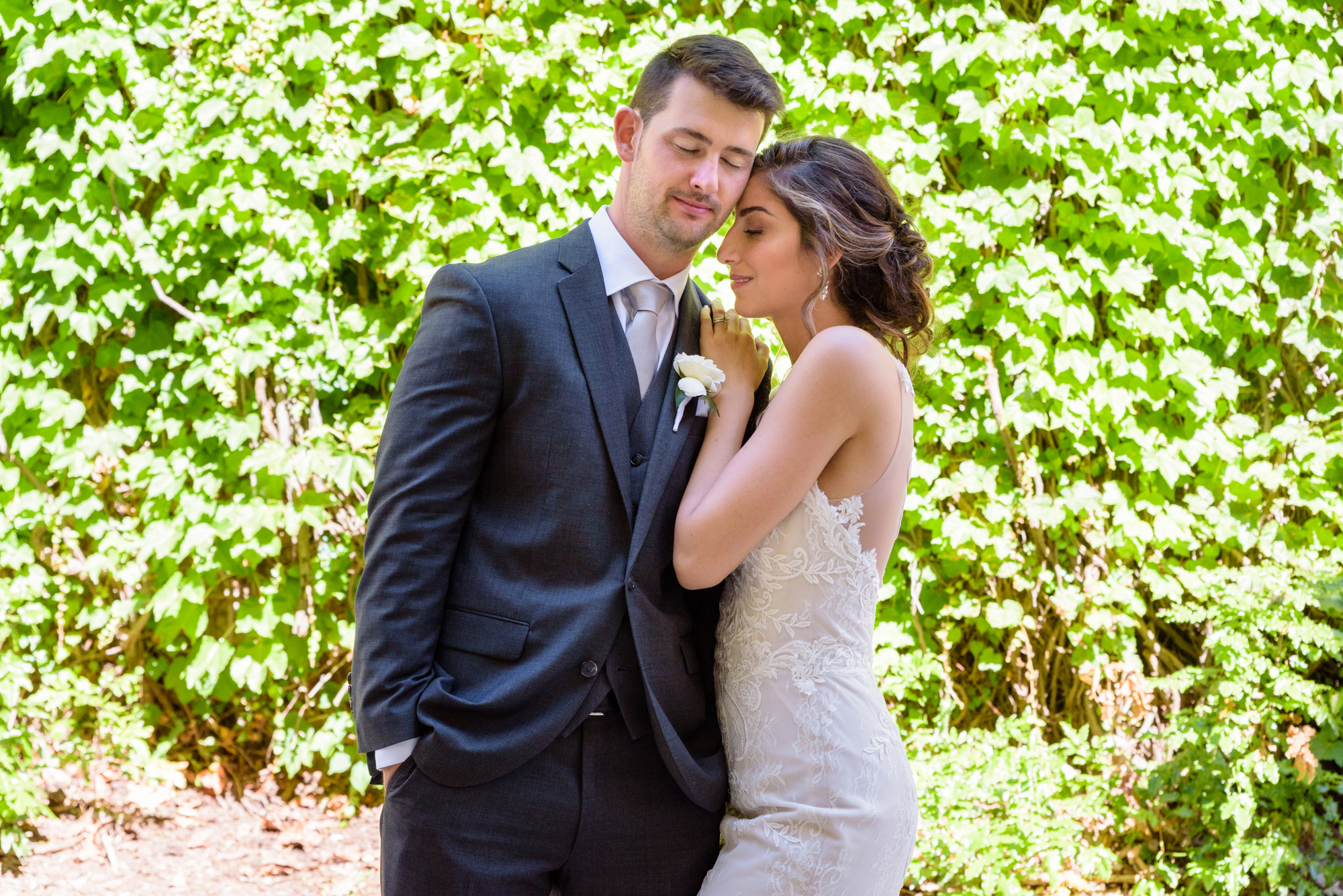 Bride & Groom outside of Fitzpatrick School of Engineering after their wedding ceremony at the Basilica of the Sacred Heart on the campus of the University of Notre Dame