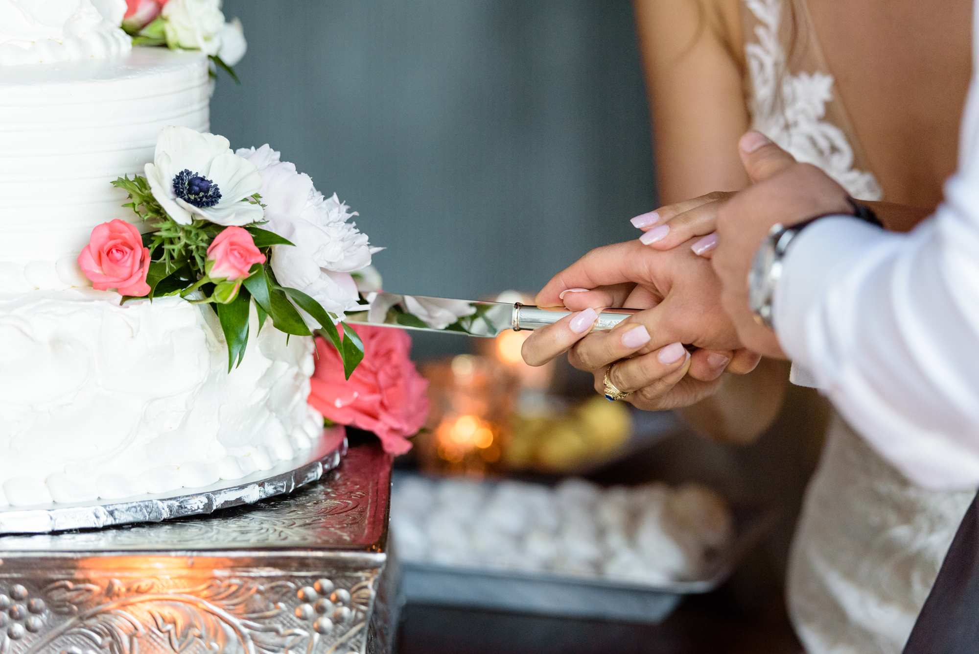 Bride & Groom’s cake cutting at a Wedding Reception at The Brick