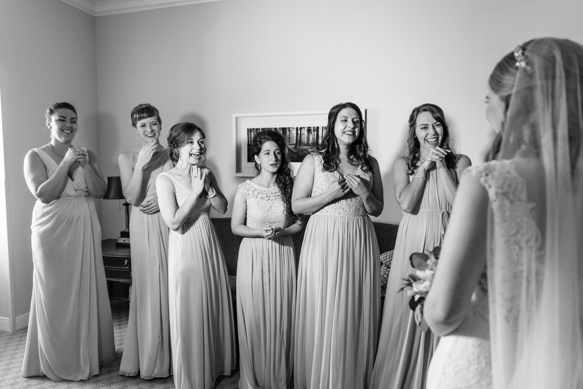 Bridesmaid reveal before a wedding ceremony at the Basilica of the Sacred Heart on the campus of the University of Notre Dame